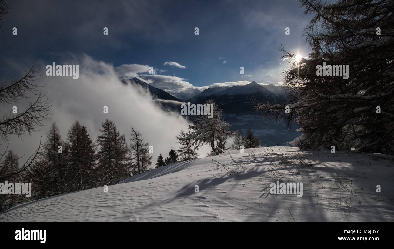 A picture of a winter Hike day in the swiss alps Stock Photo - Alamy