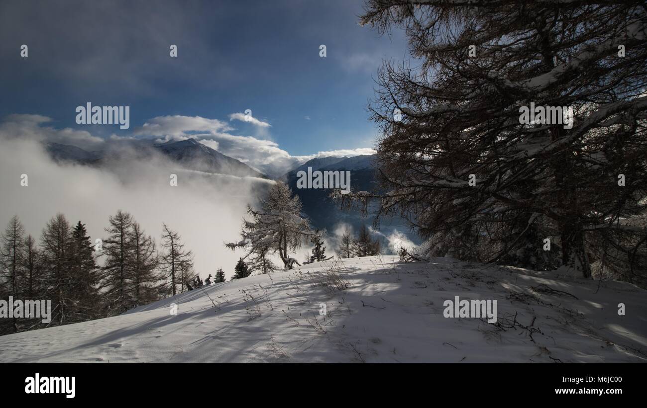 A picture of a winter Hike day in the swiss alps Stock Photo - Alamy