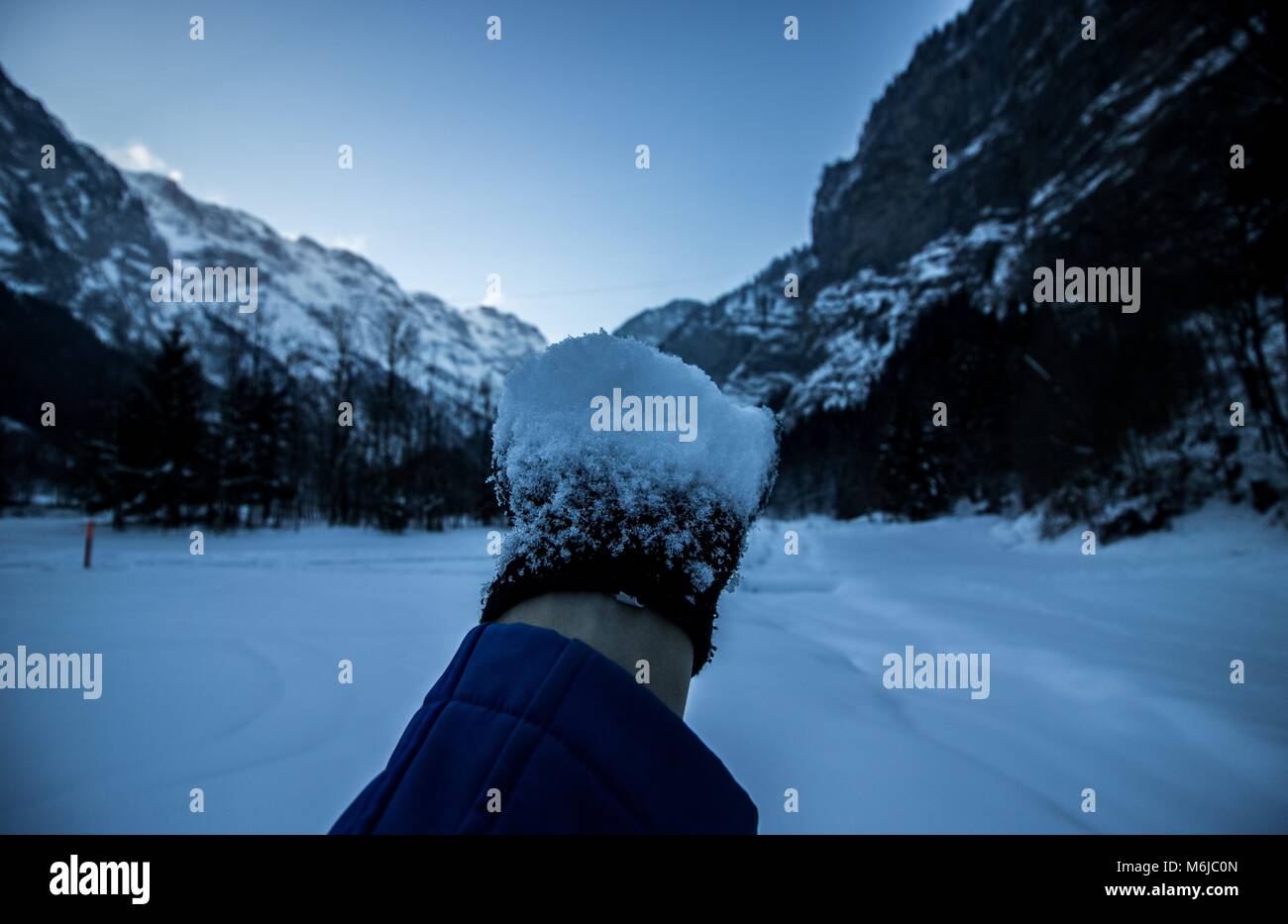 A picture of a winter Hike day in the swiss alps Stock Photo - Alamy