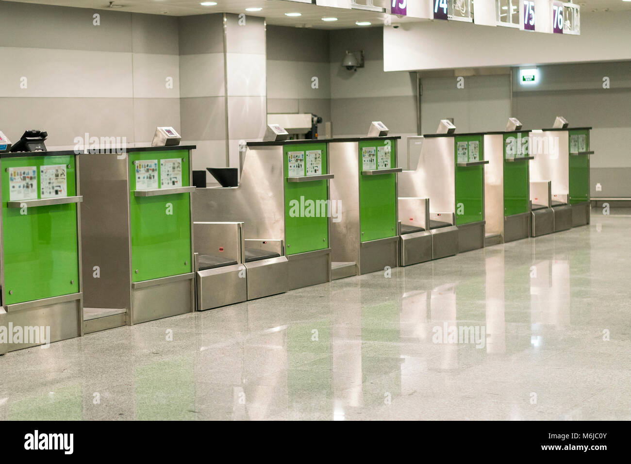 Desks in airport hall. The deserted airport. An empty terminal. The