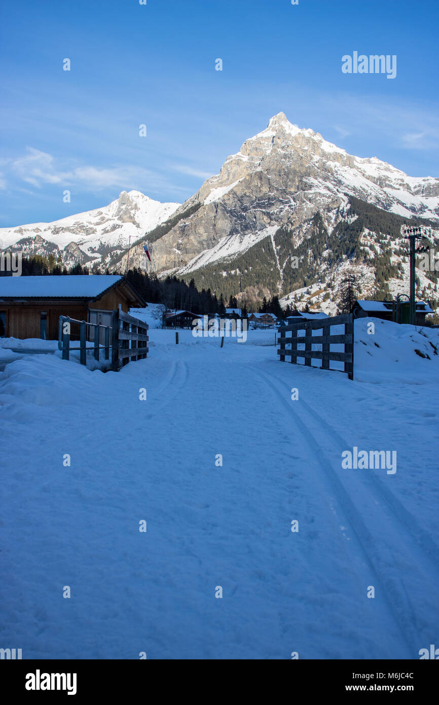 A picture of a winter Hike day in the swiss alps Stock Photo - Alamy