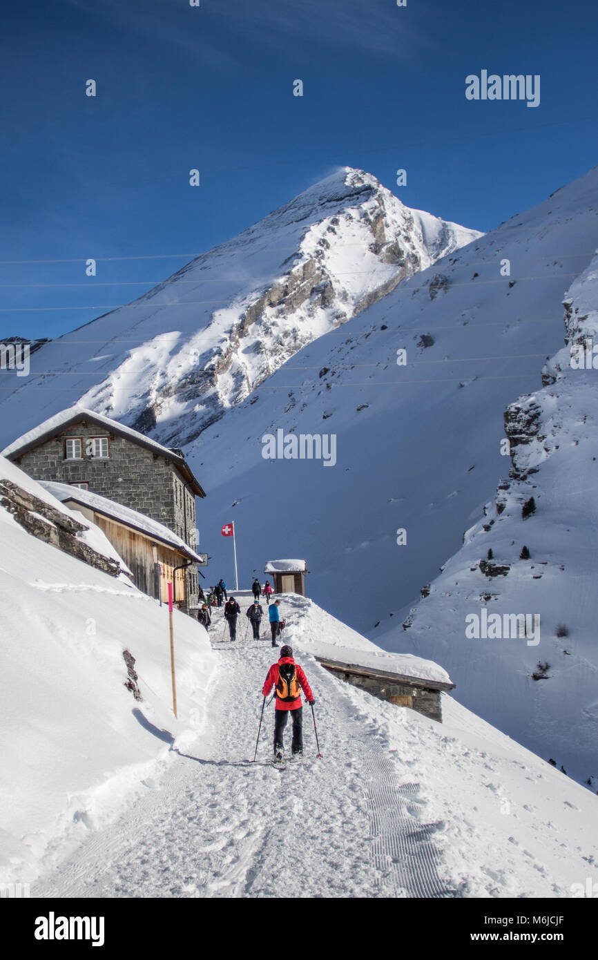 A picture of a winter Hike day in the swiss alps Stock Photo - Alamy