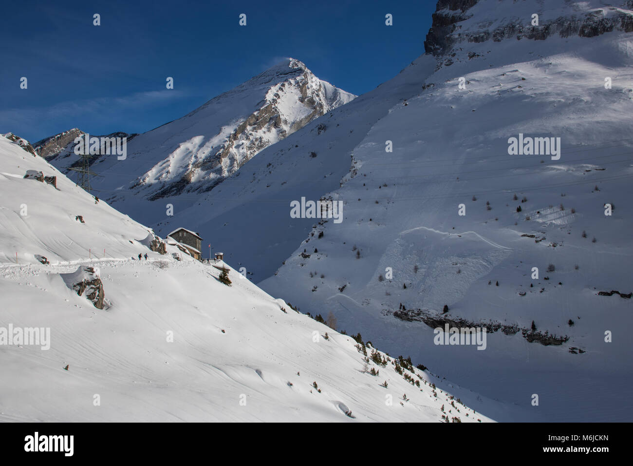 A picture of a winter Hike day in the swiss alps Stock Photo - Alamy