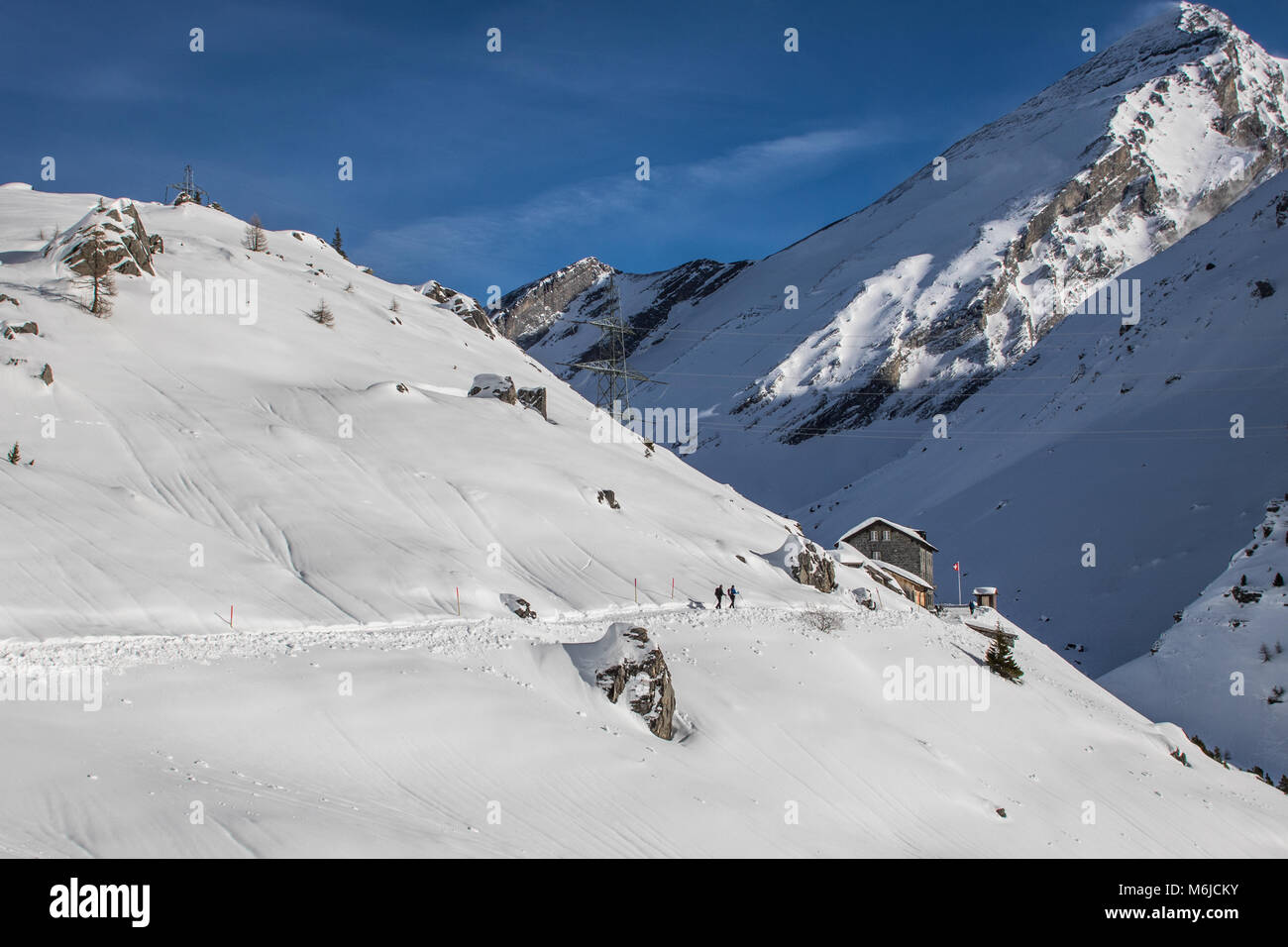 A picture of a winter Hike day in the swiss alps Stock Photo - Alamy