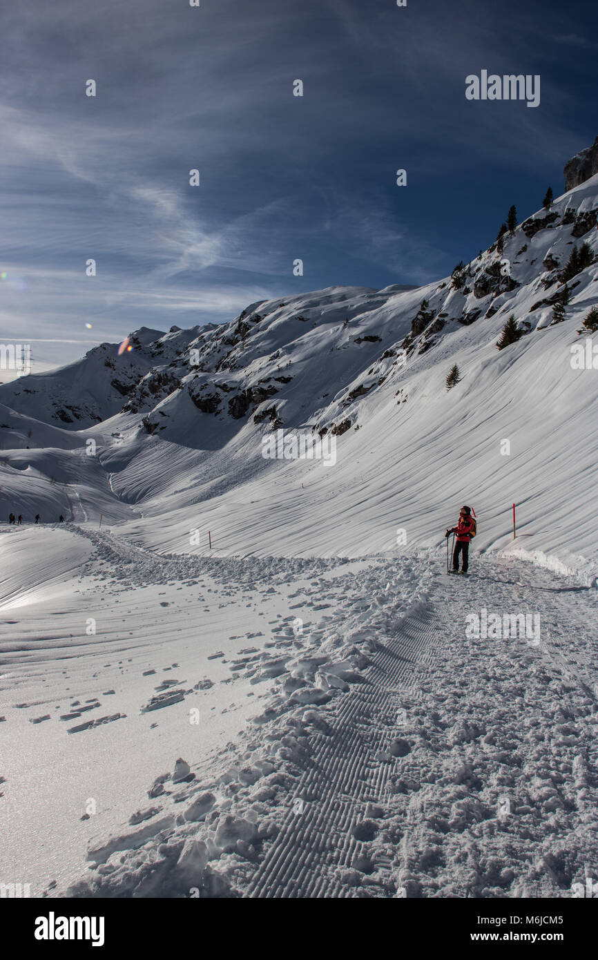 A picture of a winter Hike day in the swiss alps Stock Photo - Alamy