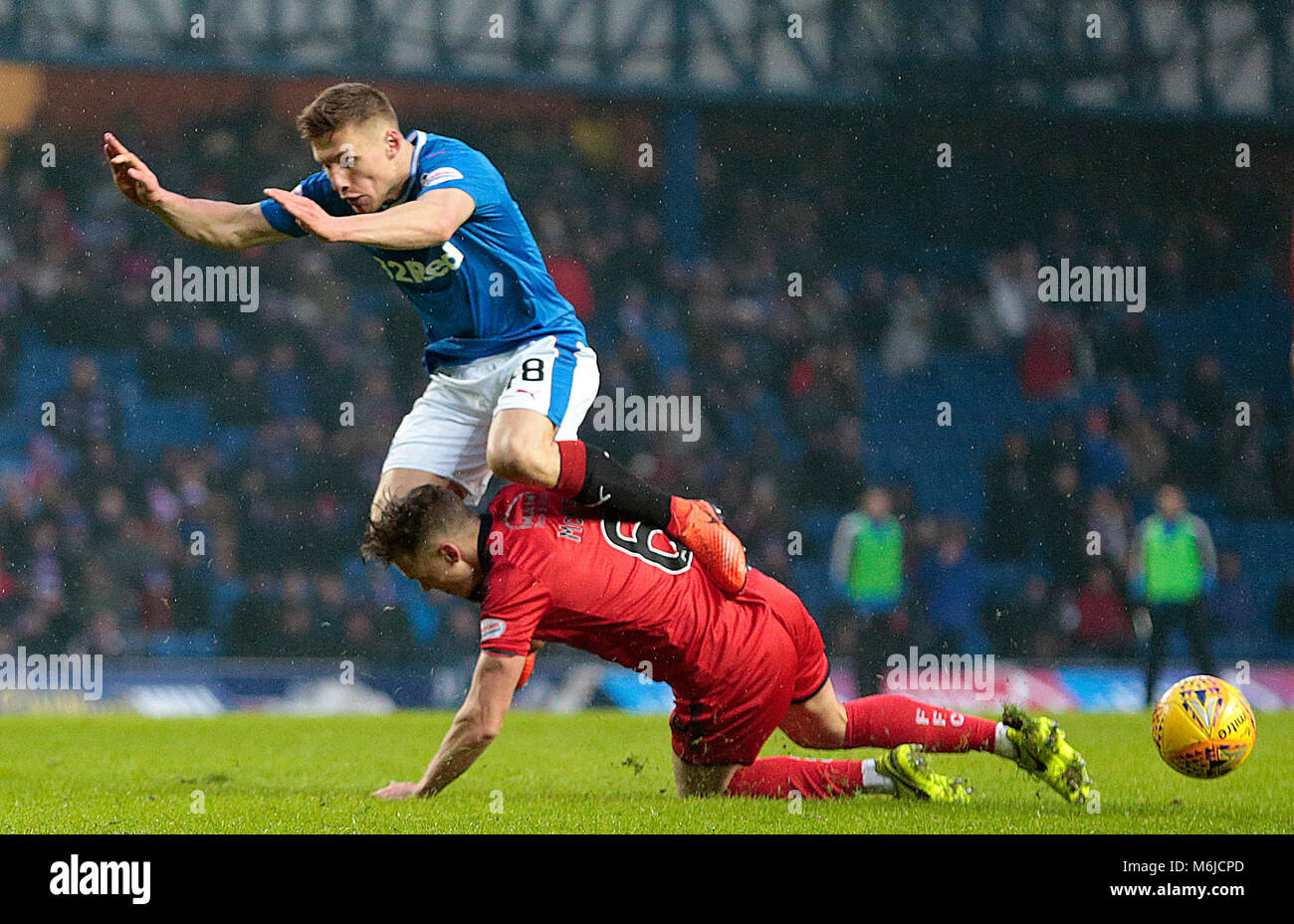 Greg Docherty Rangers Rangers' Greg Docherty (left) and Falkirk's Joe McKee battle for the ...