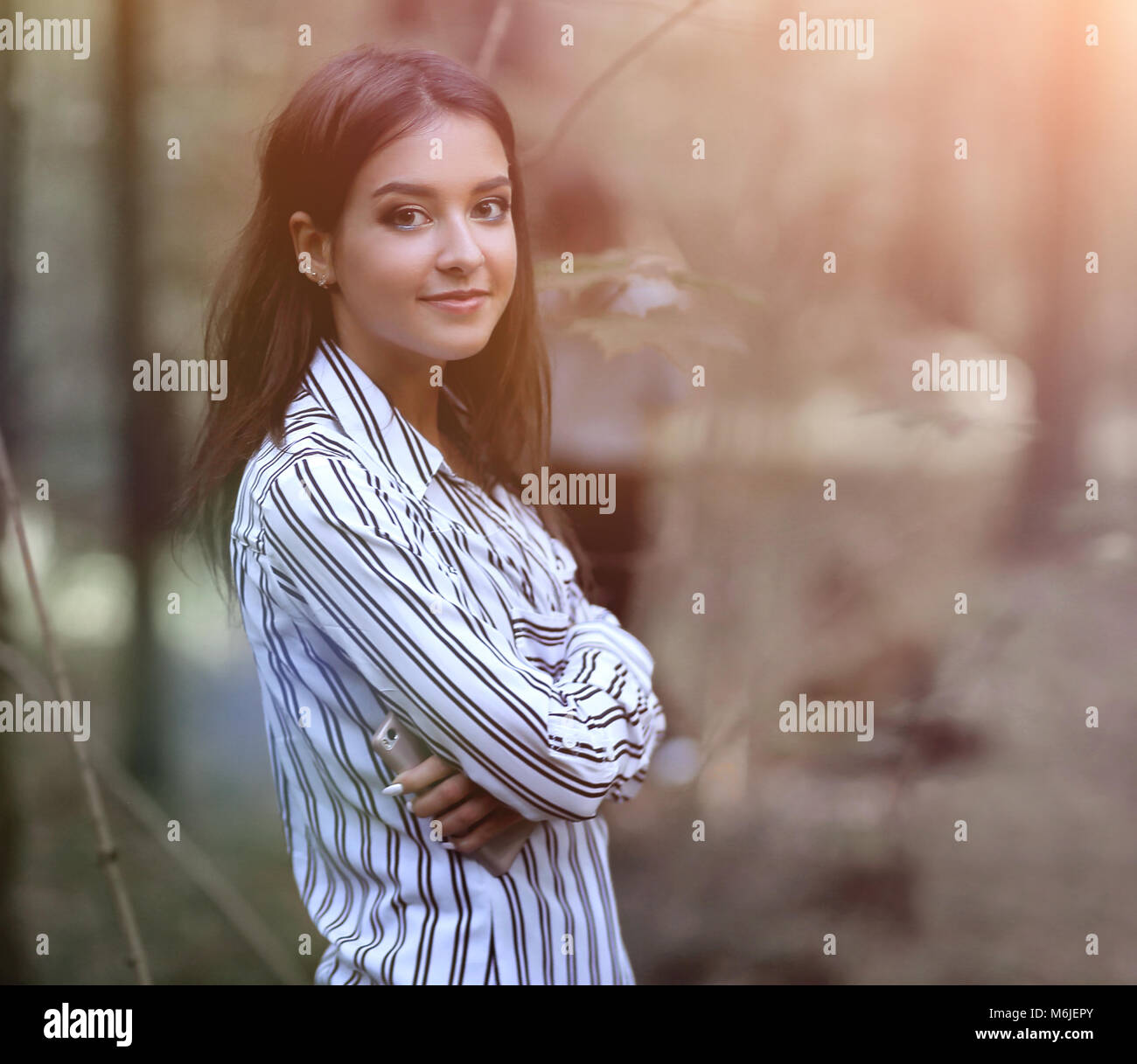 portrait of a young woman in a forest Stock Photo - Alamy
