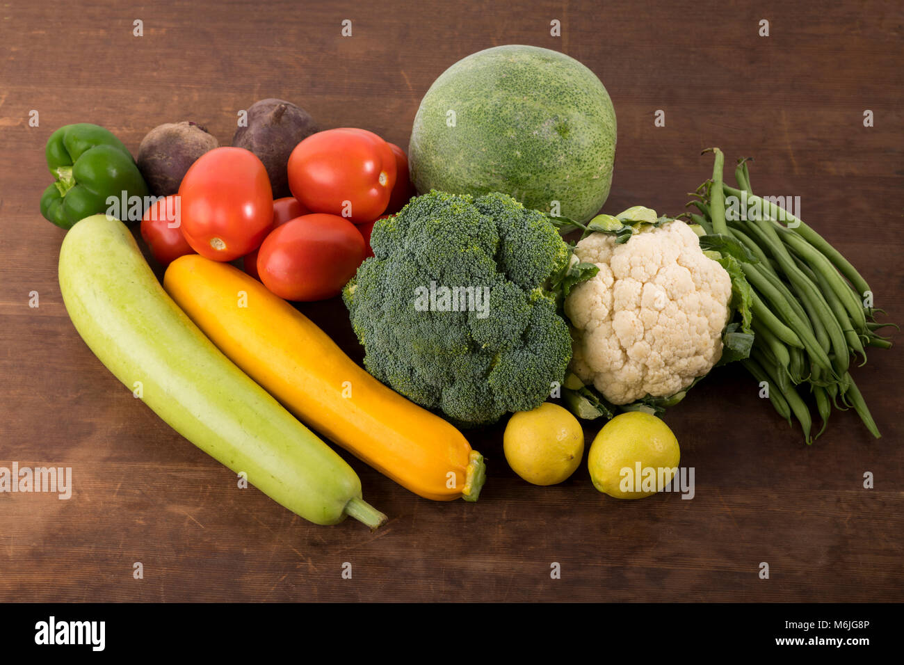 Vegetable:  Close up of  Mixed Vegetable Shot in Studio Isolated on Wooden Background Stock Photo