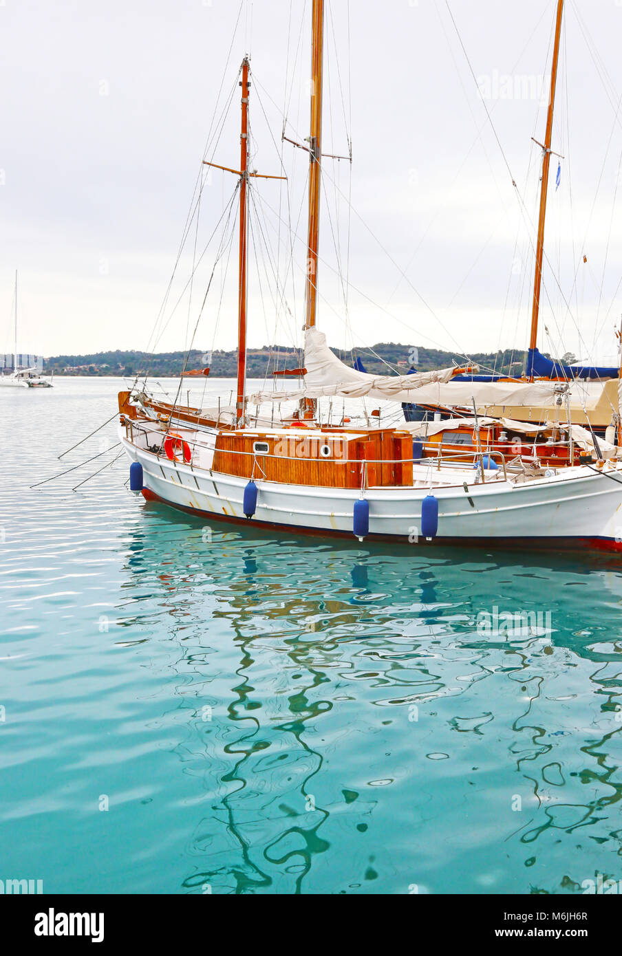 boat reflection on sea at Porto Heli Argolis Greece Stock Photo