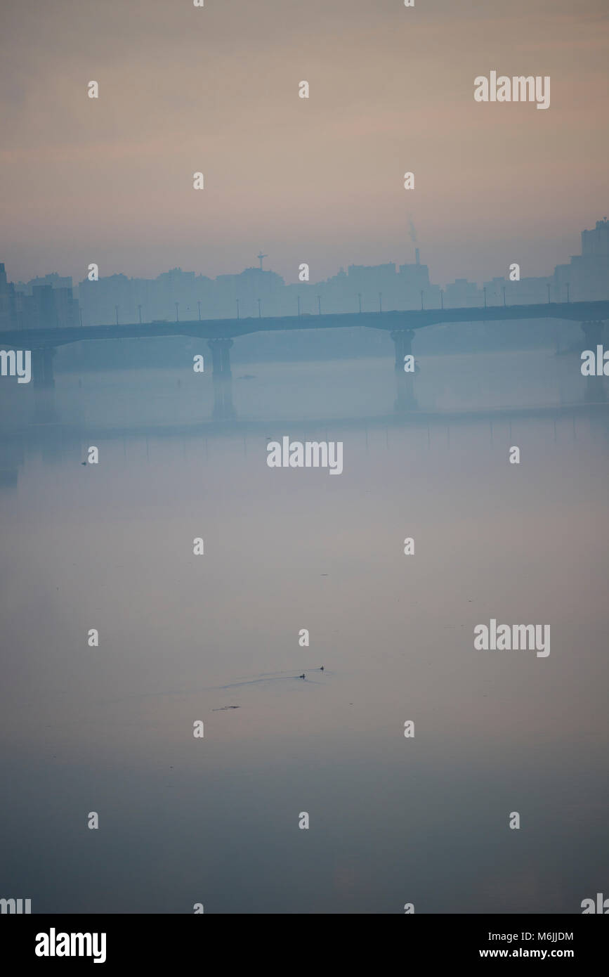 Foggy morning view from the Metro Bridge, Kyiv, Ukraine Stock Photo