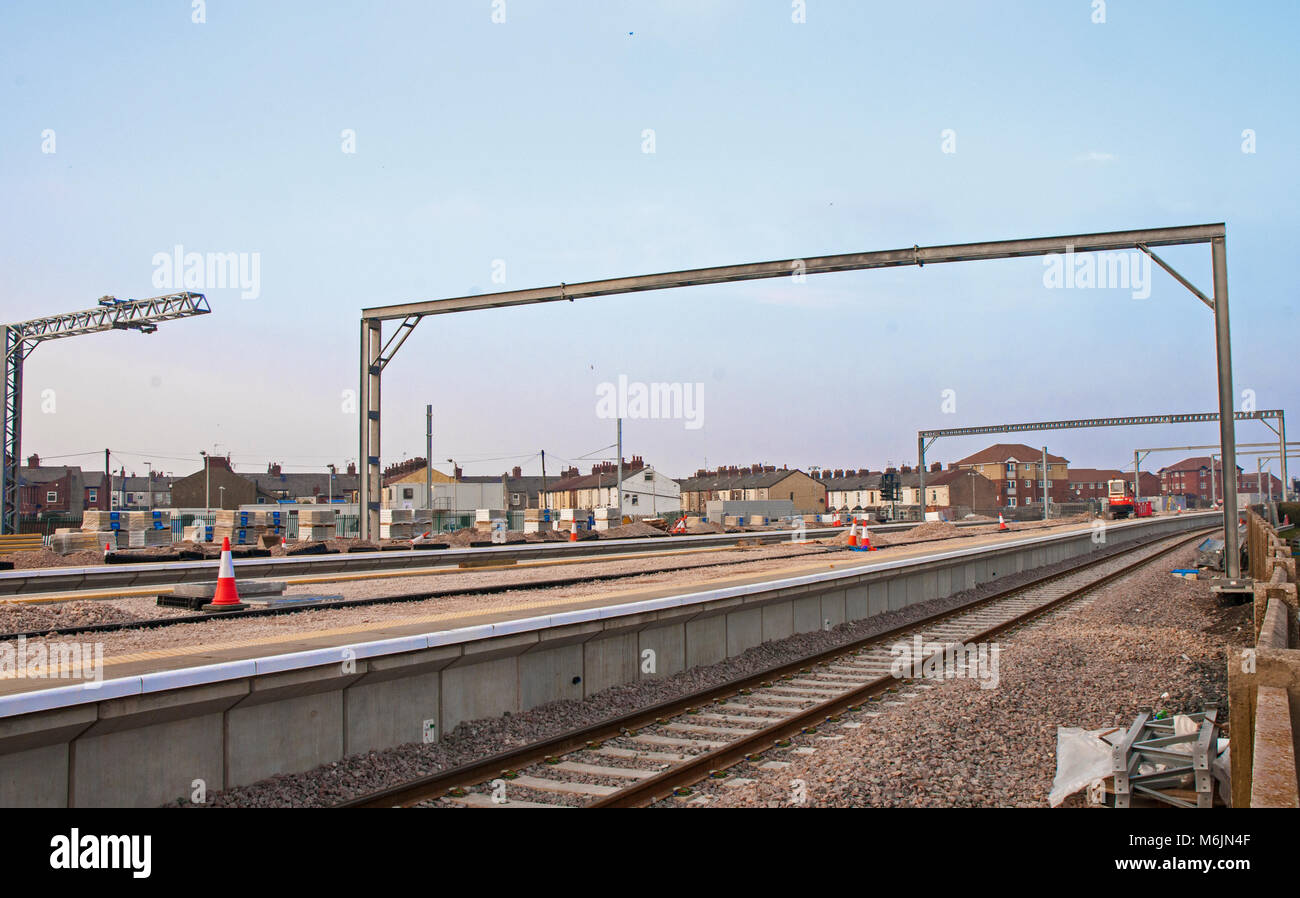 Preparing Platforms and overhead gantrys at Blackpool North station for electrification of railway line from Preston Stock Photo