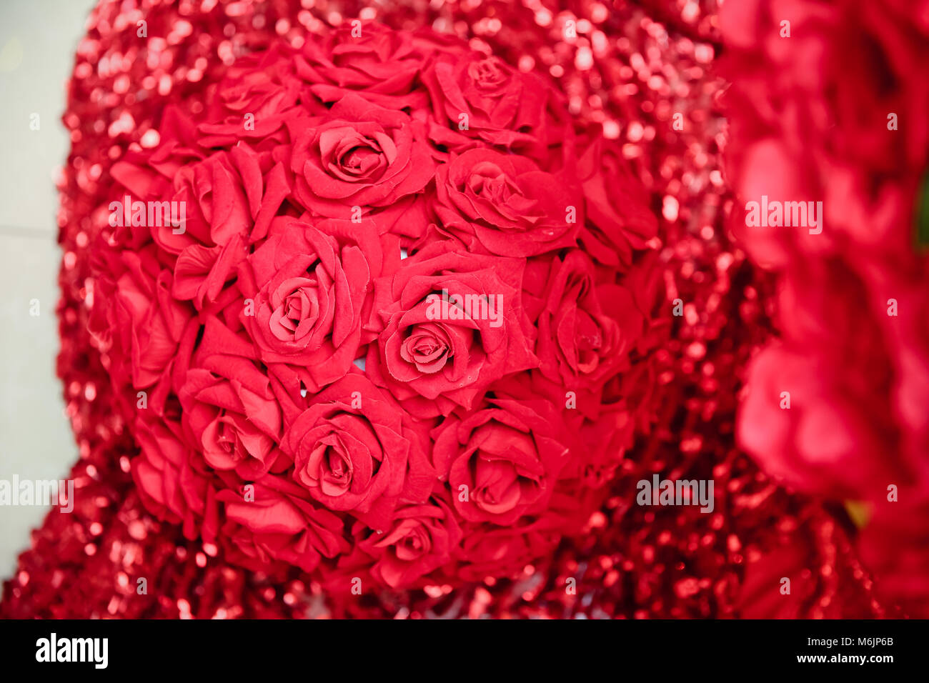 Round artificial red rose bouquet for engagement Stock Photo Alamy
