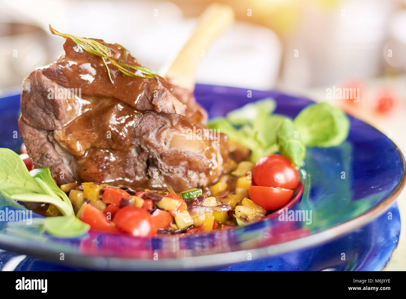 Slow cooked lamb shank with vegetables Stock Photo Alamy