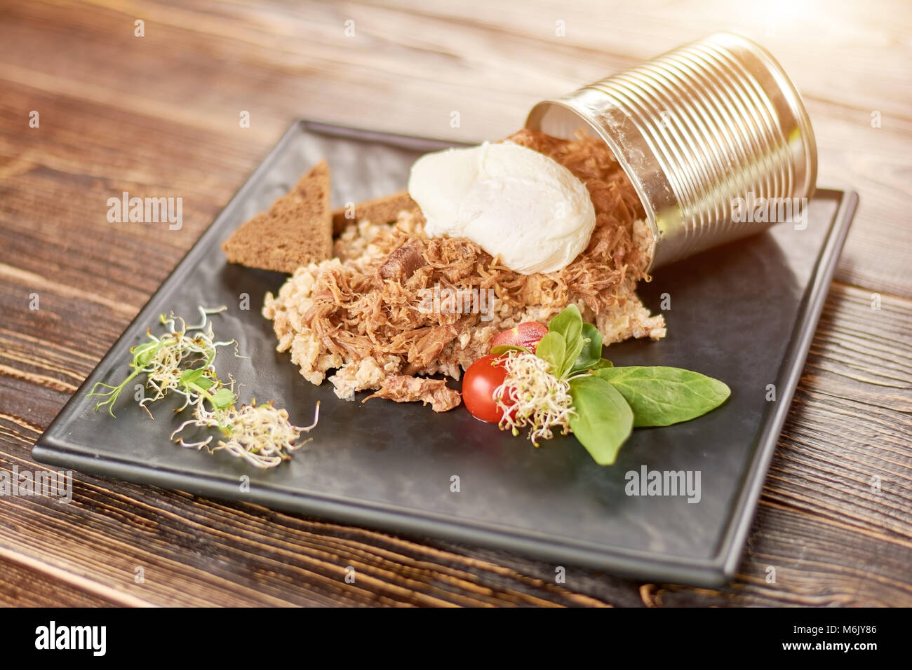 Pearl barley porridge with meat and sauce. Stock Photo