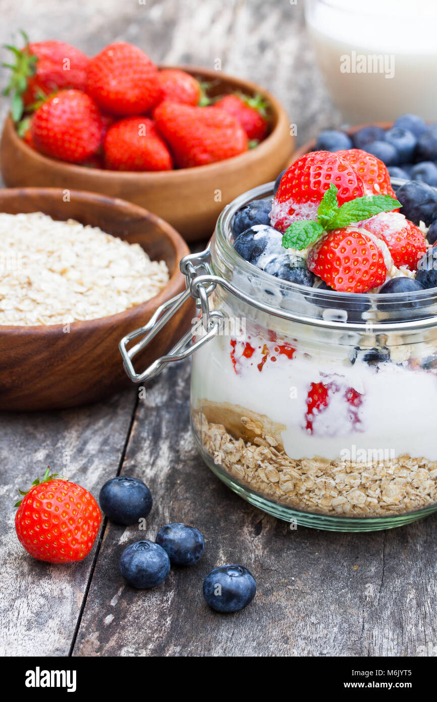 fresh  yoghurt with oat flakes and berries Stock Photo