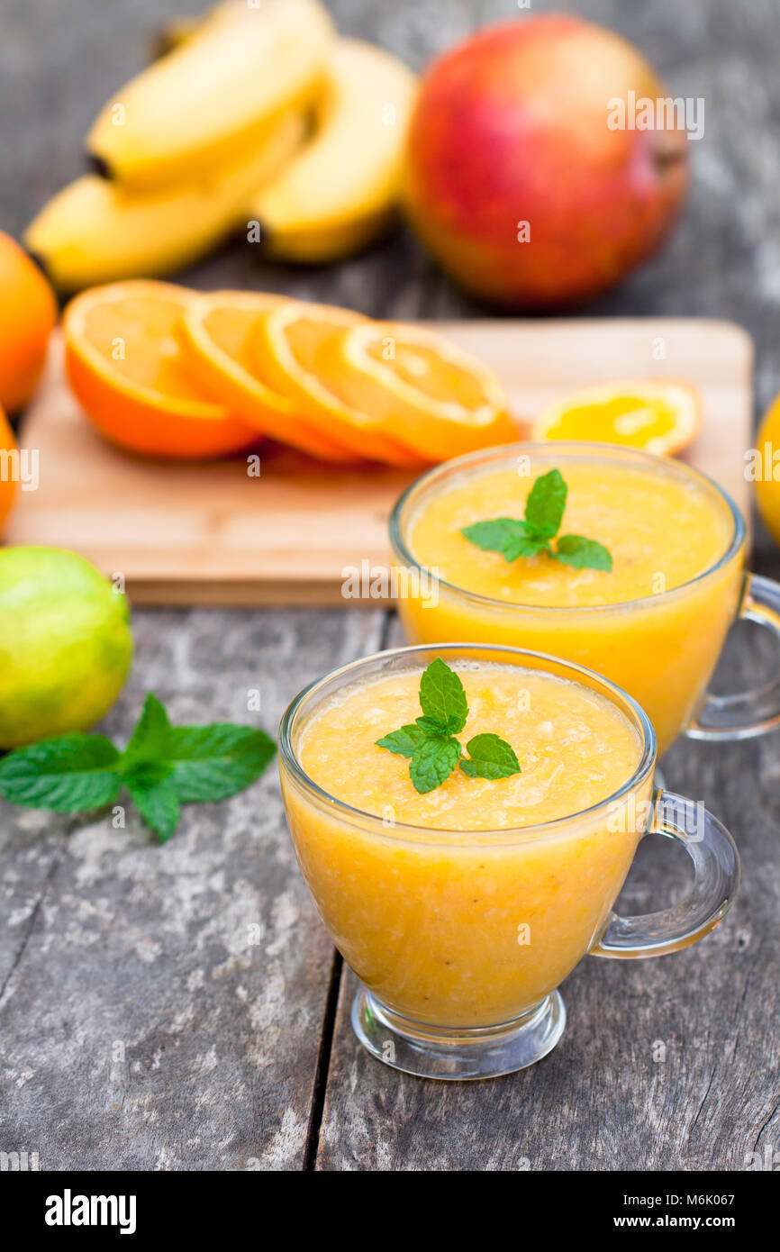 Fresh Healthy Pulpy Juice With Orange Fruits And Vegetables Stock Photo ...