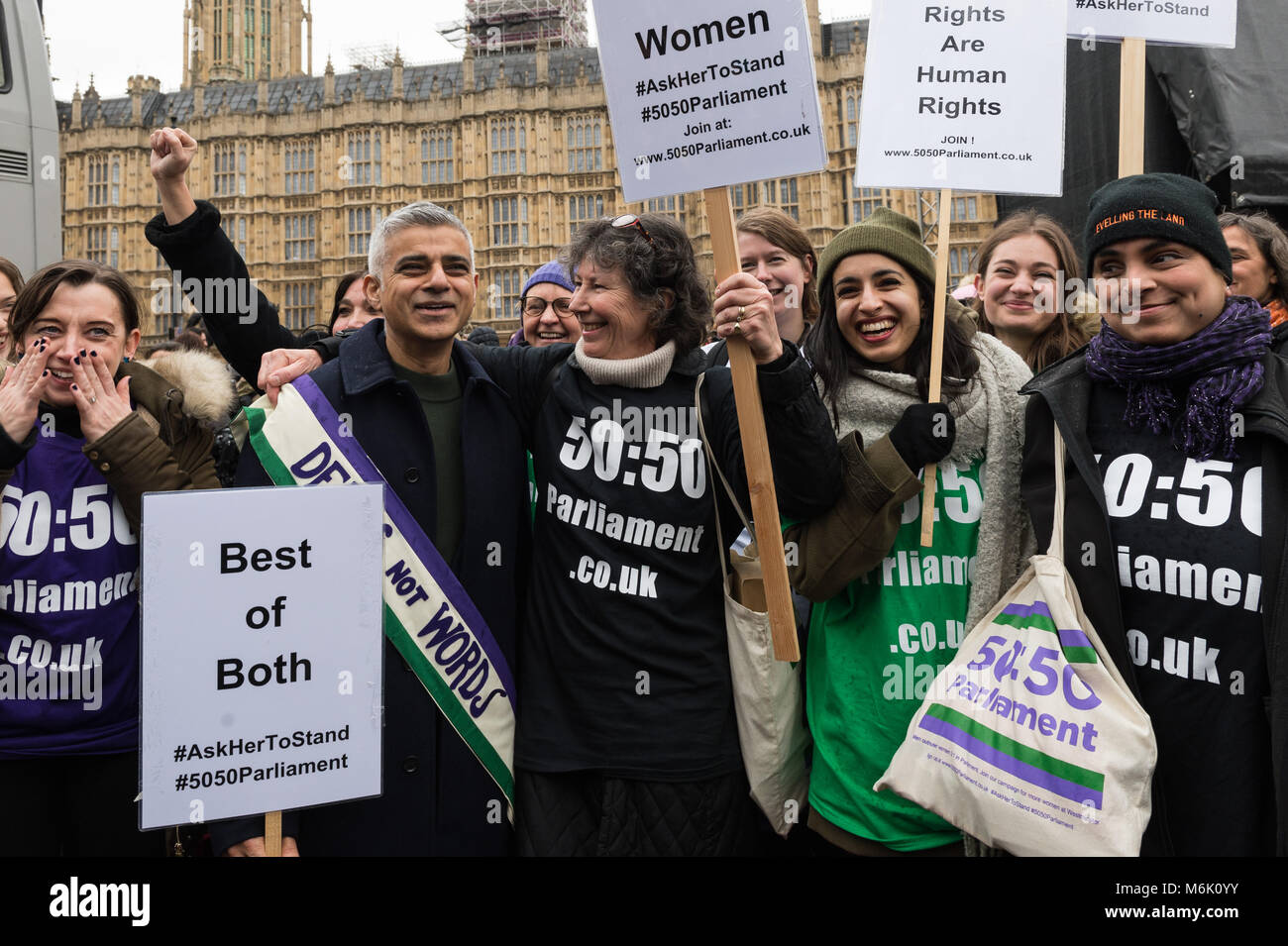 London, UK. 4th March, 2018. Mayor of London Sadiq Khan (2L) with activists at Old Palace Yard outside the Houses of Parliament in London ahead of March4Women, an annual event to celebrate International Women's Day and 100 years since women in the UK first gained the right to vote. The event, organised by CARE International, aims to highlight inequality faced by women and girls around the world and campaign for gender equality and women's rights worldwide. Credit: Wiktor Szymanowicz/Alamy Live News Stock Photo