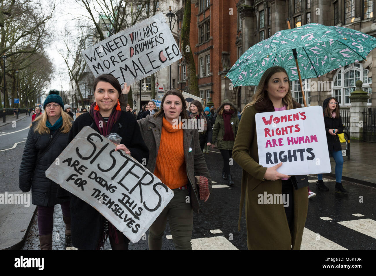 London, UK. 4th March, 2018. Thousands of people including politicians, celebrities and activists gather outside the Houses of Parliament in London to take part in March4Women, an annual event to celebrate International Women's Day and 100 years since women in the UK first gained the right to vote. The event, organised by CARE International, aims to highlight inequality faced by women and girls around the world and campaign for gender equality and women's rights worldwide. Credit: Wiktor Szymanowicz/Alamy Live News Stock Photo