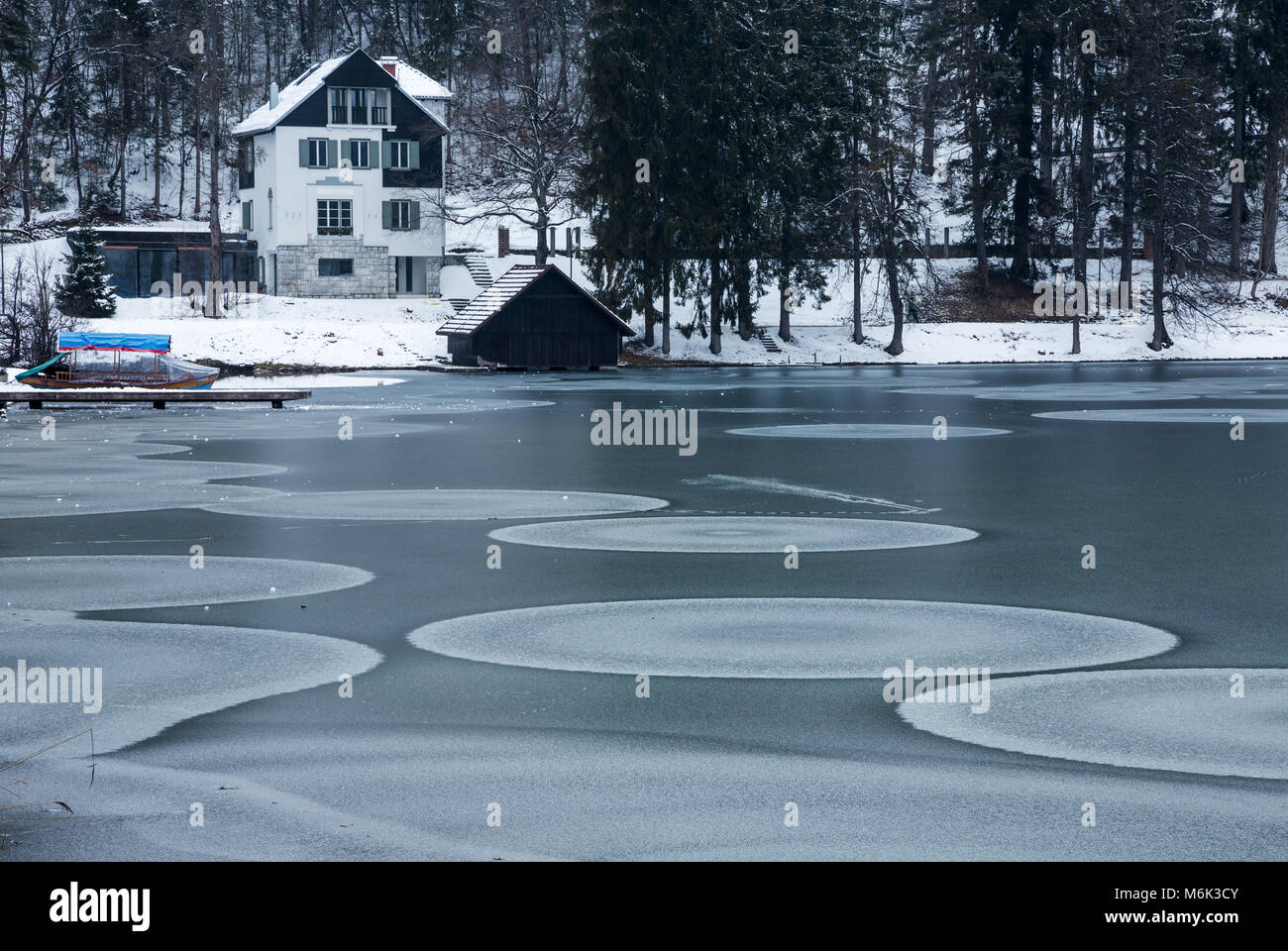 Lake Bled, Slovenia. 4th Mar, 2018. Ice circles on a frozen Lake Bled, Slovenia. The western side of the lake is slightly frozen after the Siberian storm brought freezing temperatures across Europe late February. Credit: Ian Middleton/Alamy Live News Stock Photo