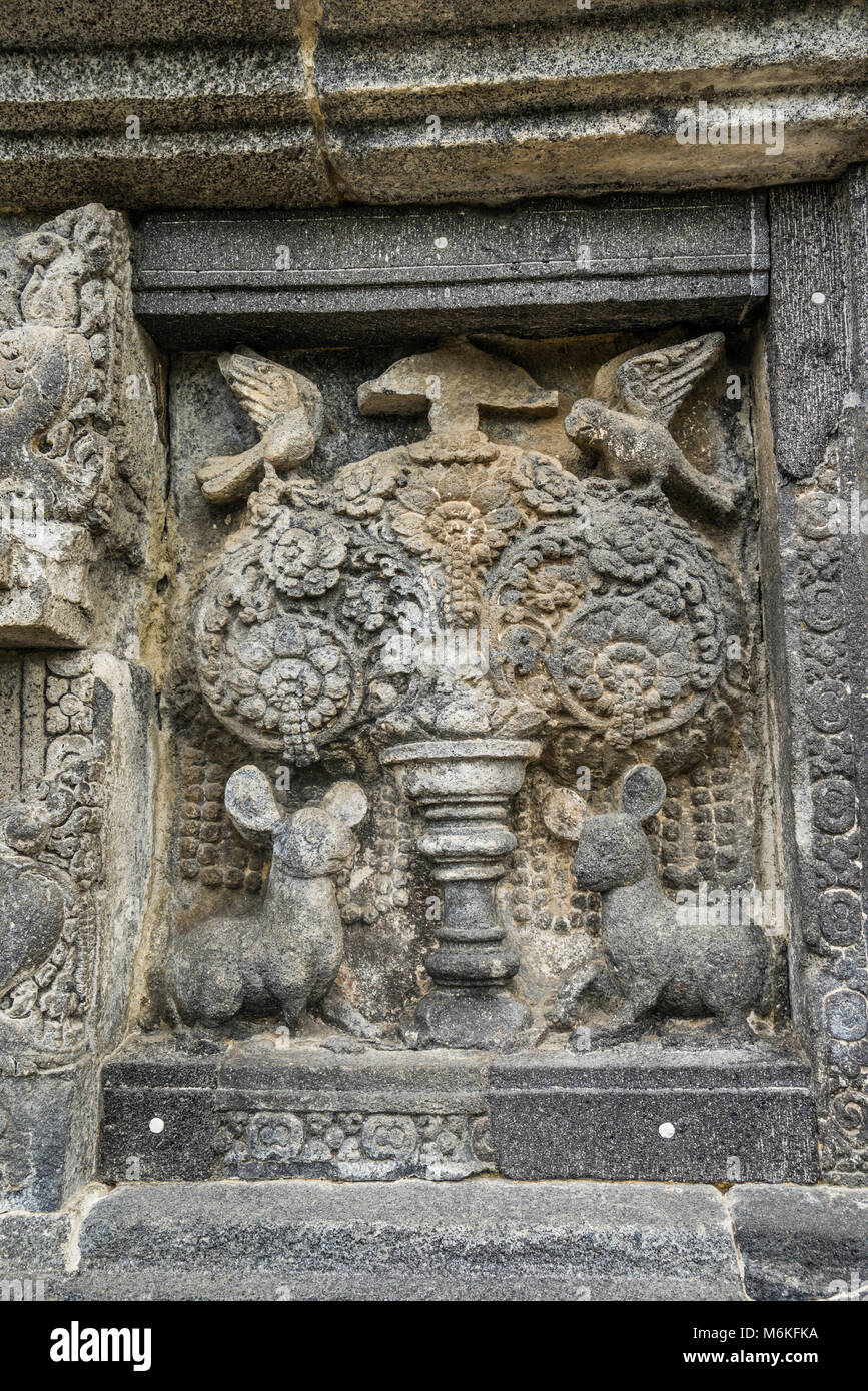 Indonesia, Central Java, relief panel with kalpataru tree flanked by animals and birds at the mid-9th century Prambanan Hindu Temple Stock Photo