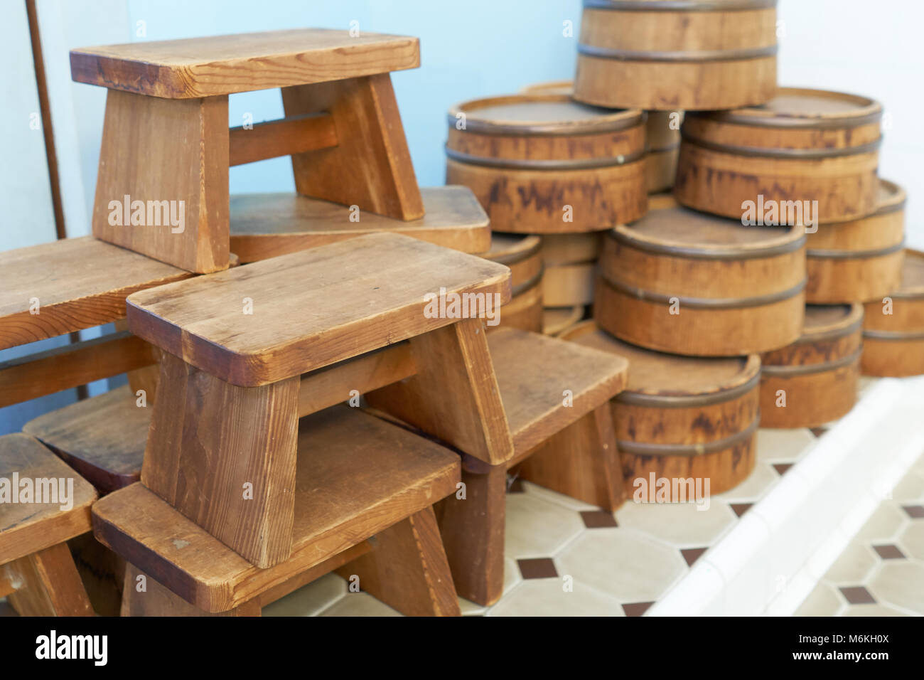 Seat for Onsen is made from wood of Japan. And a wooden shovel Bathing culture of Japan Total bathroom All the people shower together. It is of intere Stock Photo
