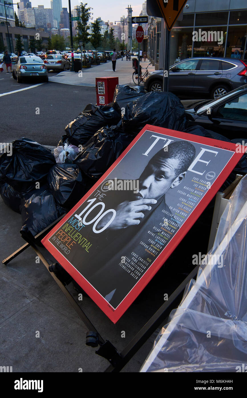 Time Magazine add showing most influential People laying with trash bags Stock Photo