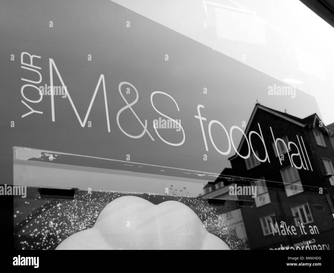 Marks and Spenser sign on shopfront window advertising food hall, company founded in 1884 by Michael Marks and Thomas Spenser Stock Photo