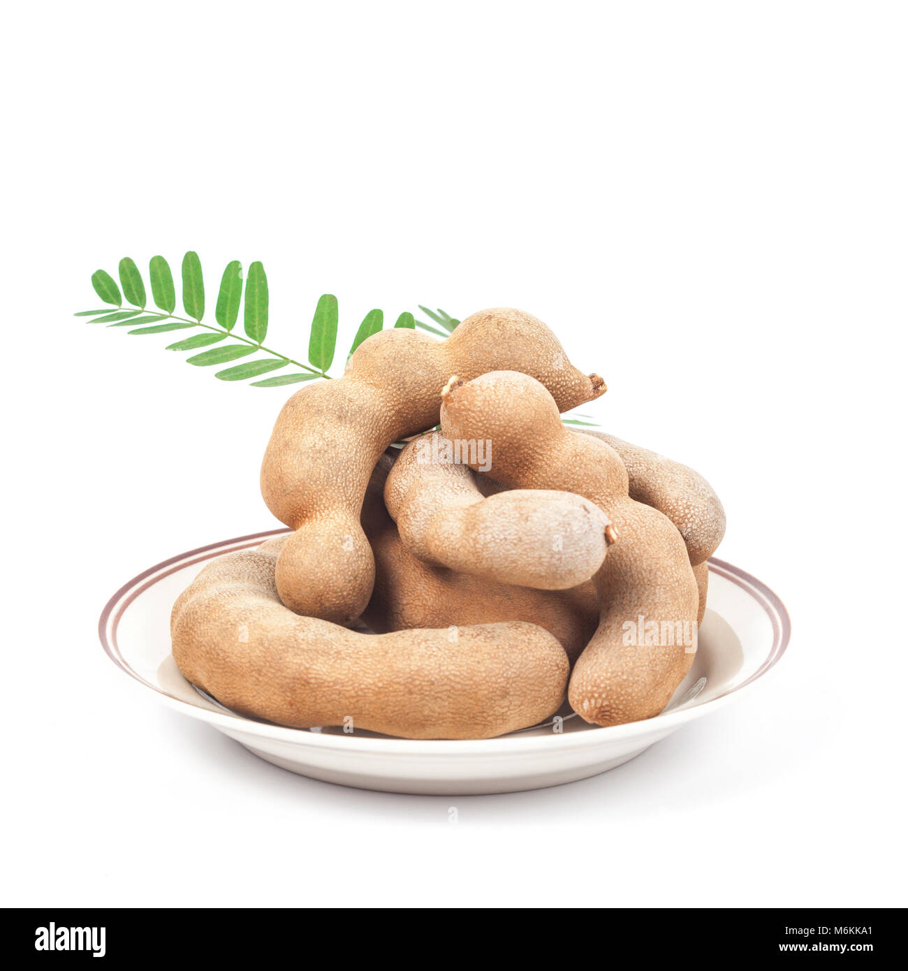 Tamarind Riped tamarind - Sweet ripe tamarind with isolated on a white background ...