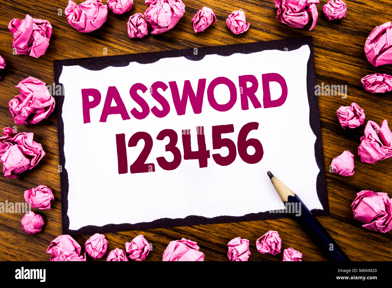 Hand writing text caption inspiration showing Password 123456. Business concept for Security Internet Written on sticky note paper, wooden background  Stock Photo