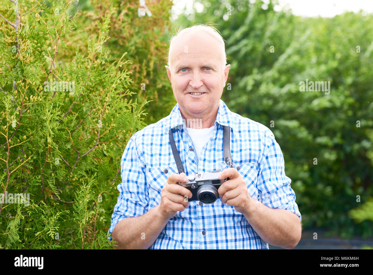 Happy man tourist using hi-res stock photography and images - Alamy