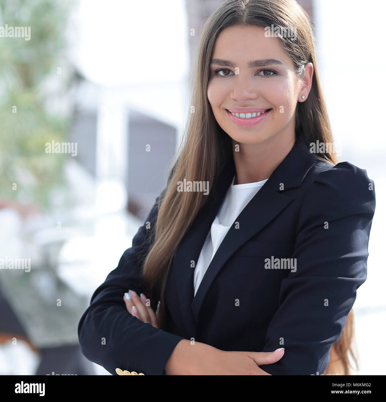 young business woman on the background of the office Stock Photo - Alamy