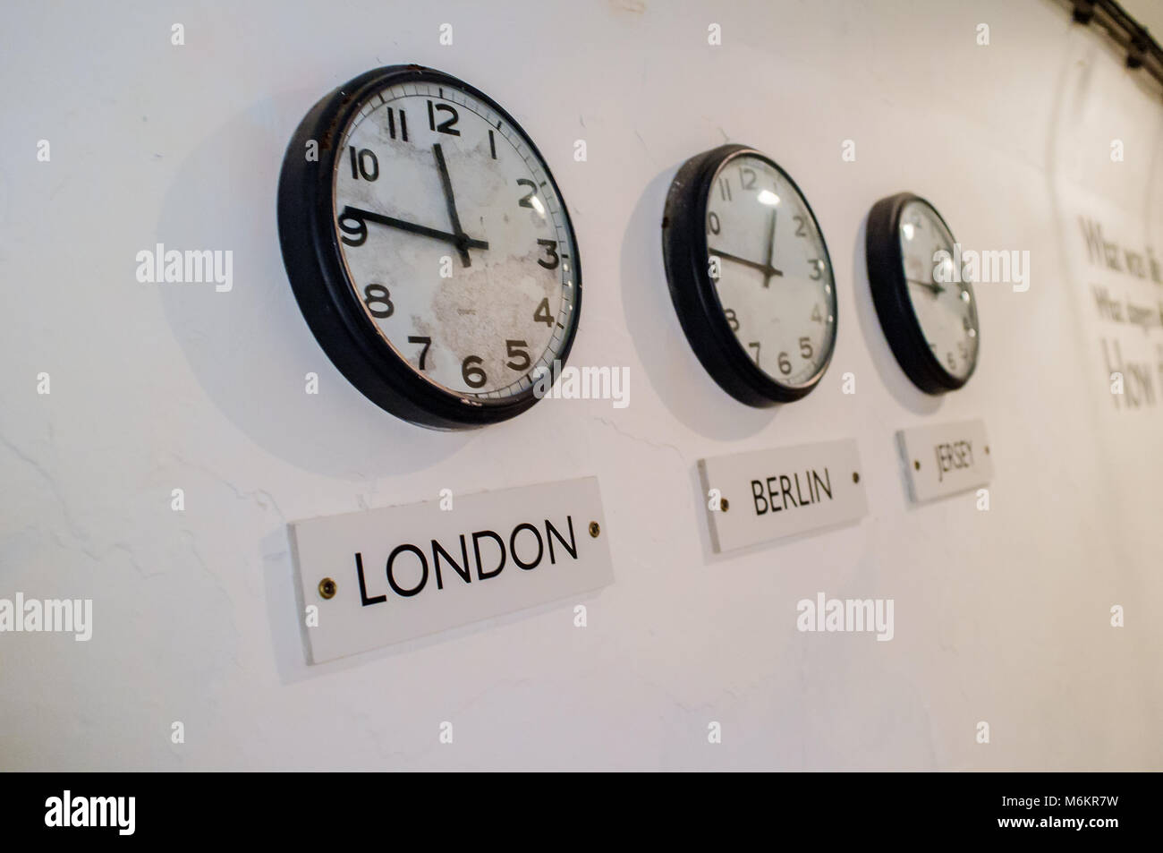 Vintage Wall Clocks In A Secret War Room Bunker Stock Photo