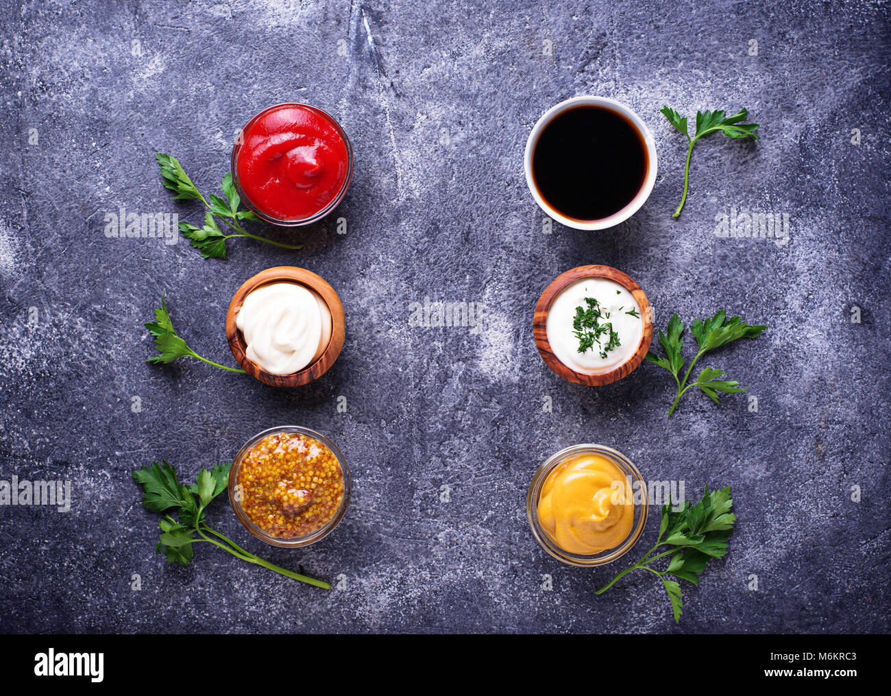 Set of different sauces. Ketchup, mayonnaise, mustard, soy sauce and