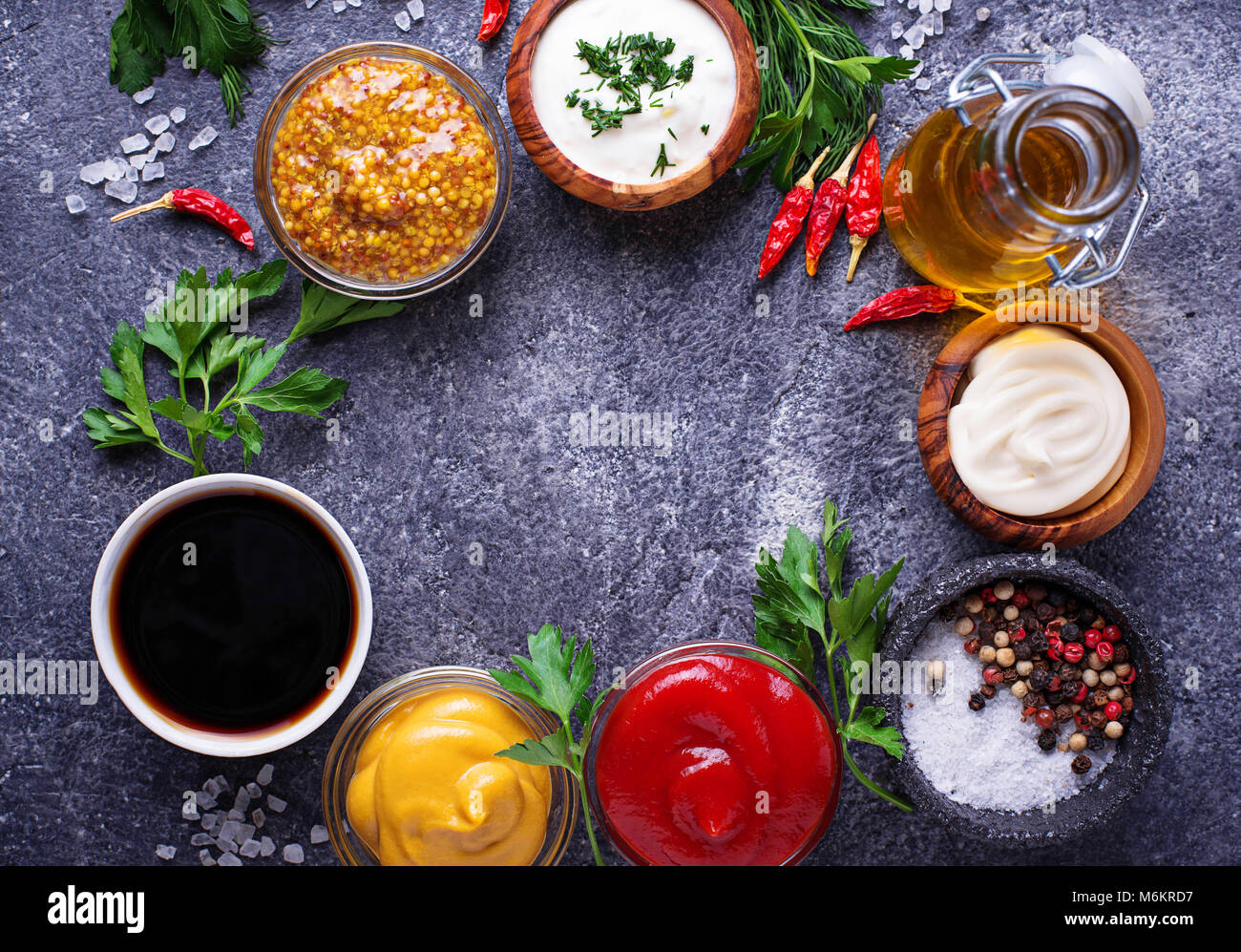 Set of different sauces. Ketchup, mayonnaise, mustard, soy sauce and