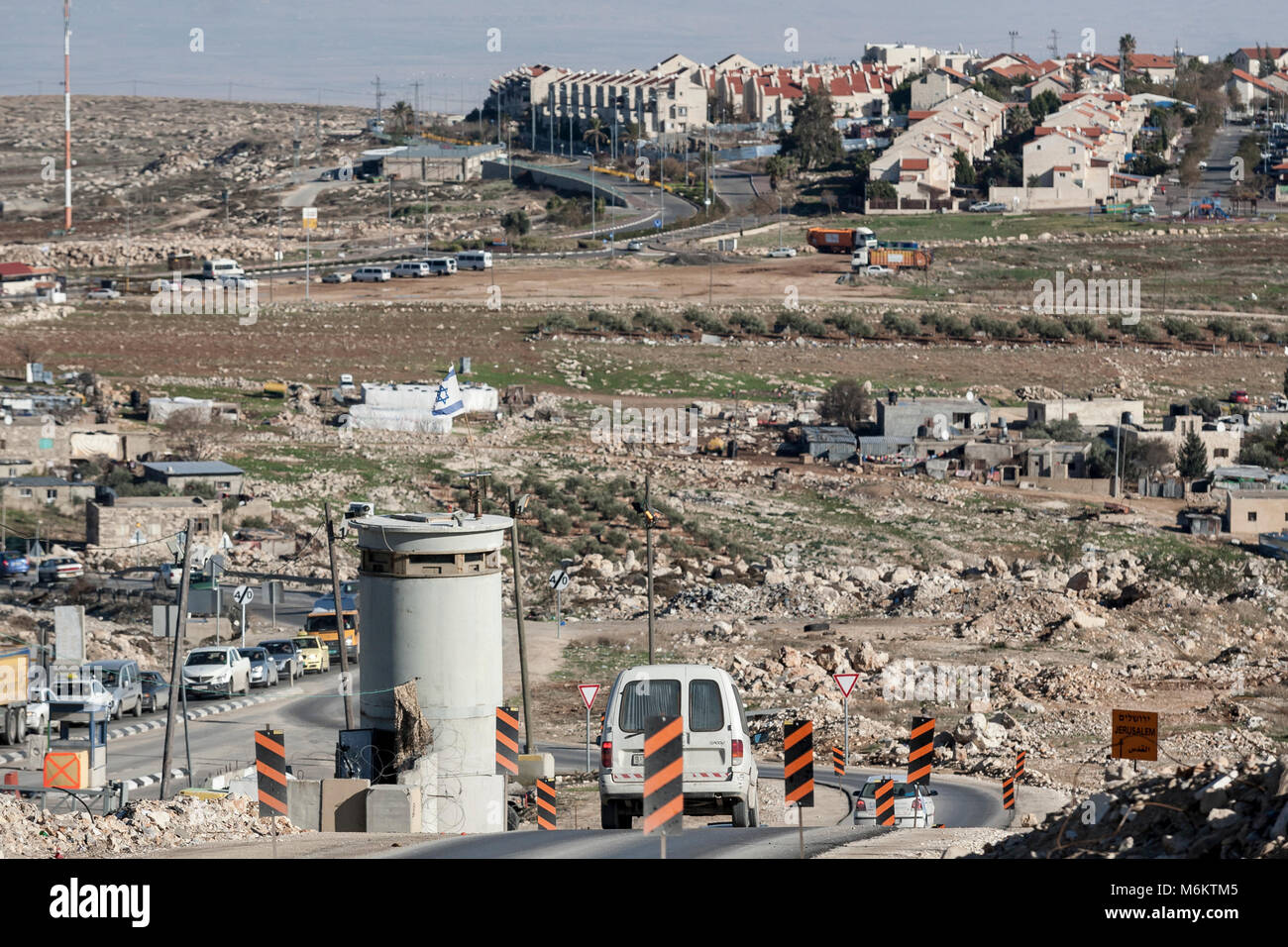 Jerusalem, Palestine, January 12, 2011: Road check point leading to Jewish settlement built on the grounds which are recognized as Palestinian Occupie Stock Photo
