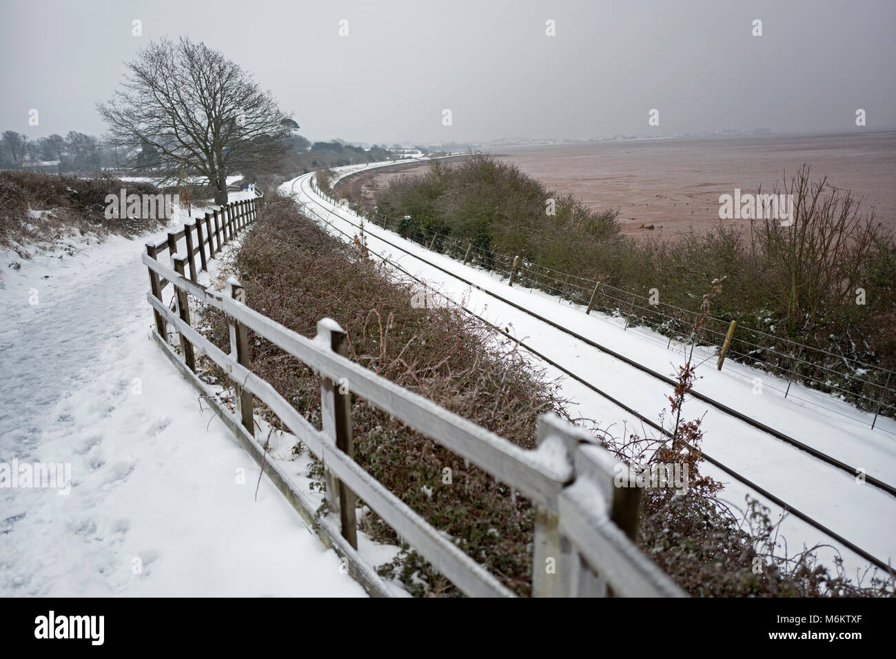 Railway track in snow, UK Stock Photo