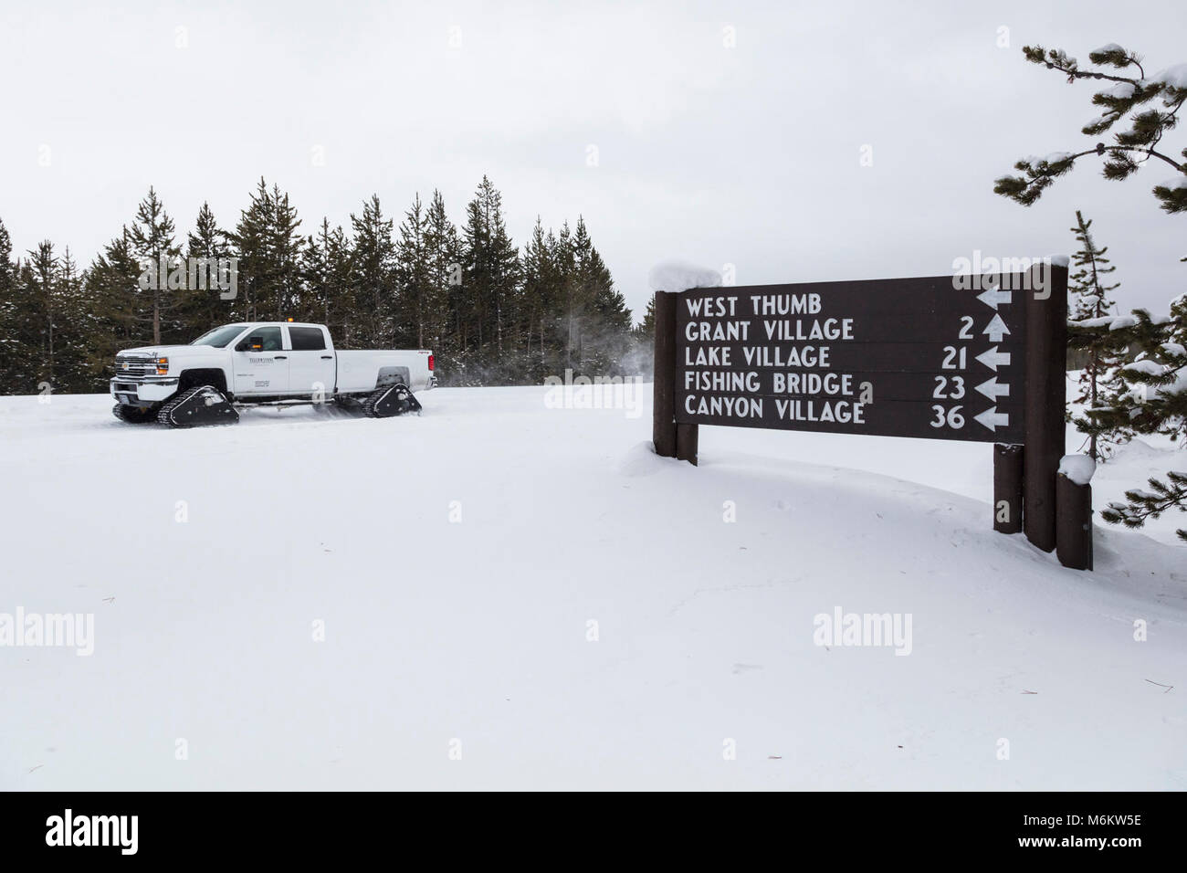 Road signs in snow junction hi-res stock photography and images - Alamy