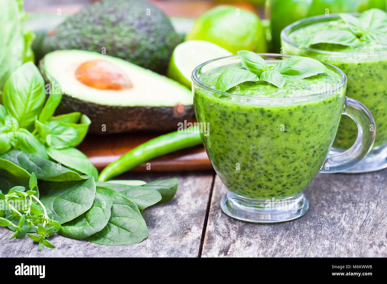 green healthy vitamin cocktail in the glass cup Stock Photo - Alamy