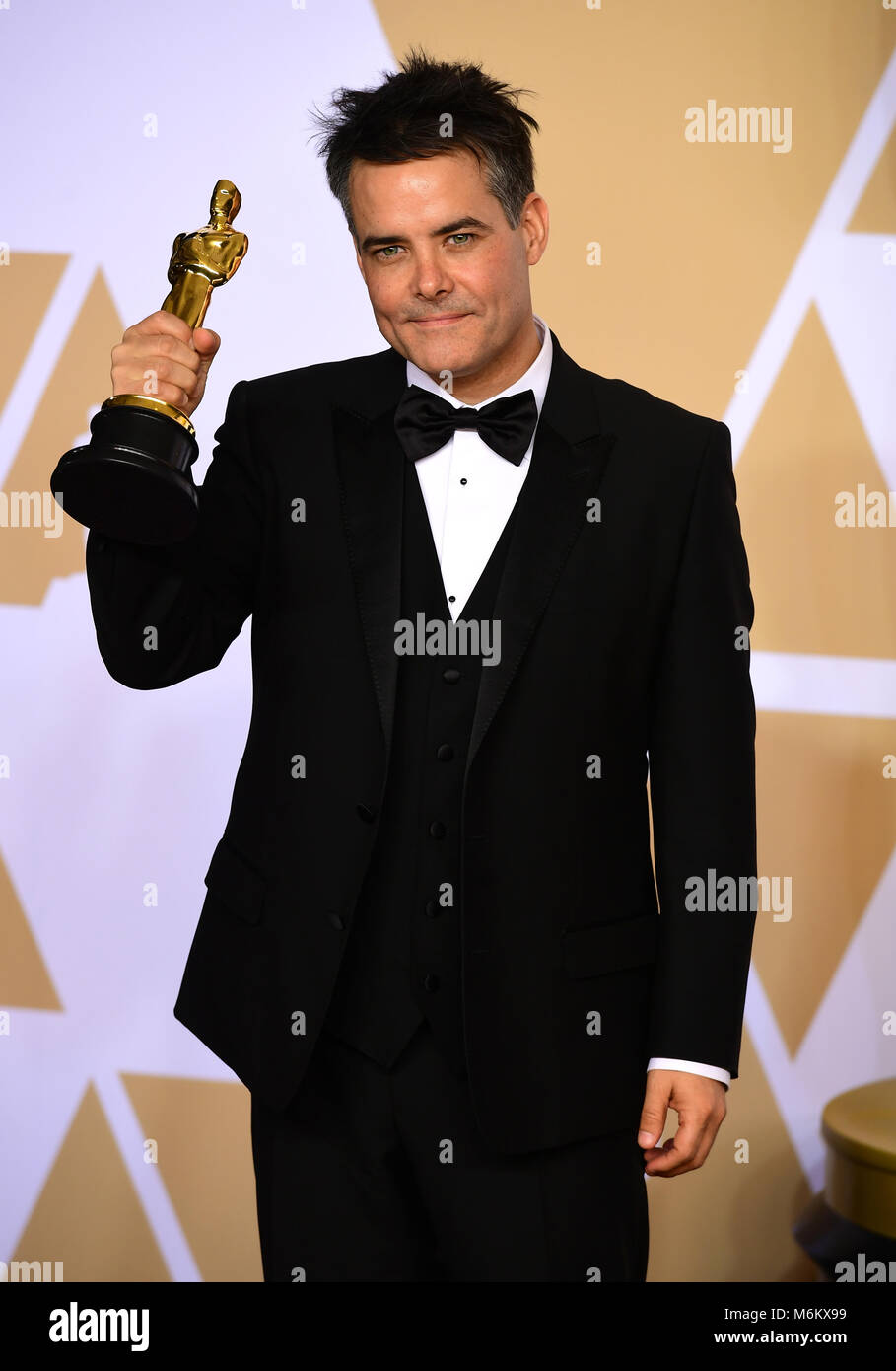 Sebastian Lelio with his Oscar for Best Foreign Language Film for A Fantastic Woman in the press room at the 90th Academy Awards held at the Dolby Theatre in Hollywood, Los Angeles, USA. PRESS ASSOCIATION Photo. Picture date: Sunday March 4, 2018. See PA Story SHOWBIZ Oscars. Photo credit should read: Ian West/PA Wire Stock Photo