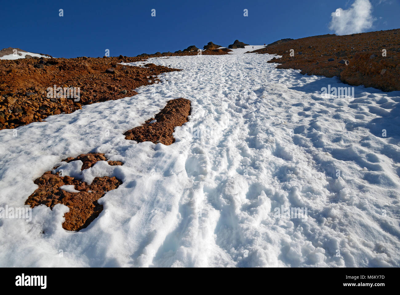Climbing terrain on Mount Shasta volcano, California 14er in the Cascade Range where glaciers, avalanches and steep snow are risks mountaineers conten Stock Photo