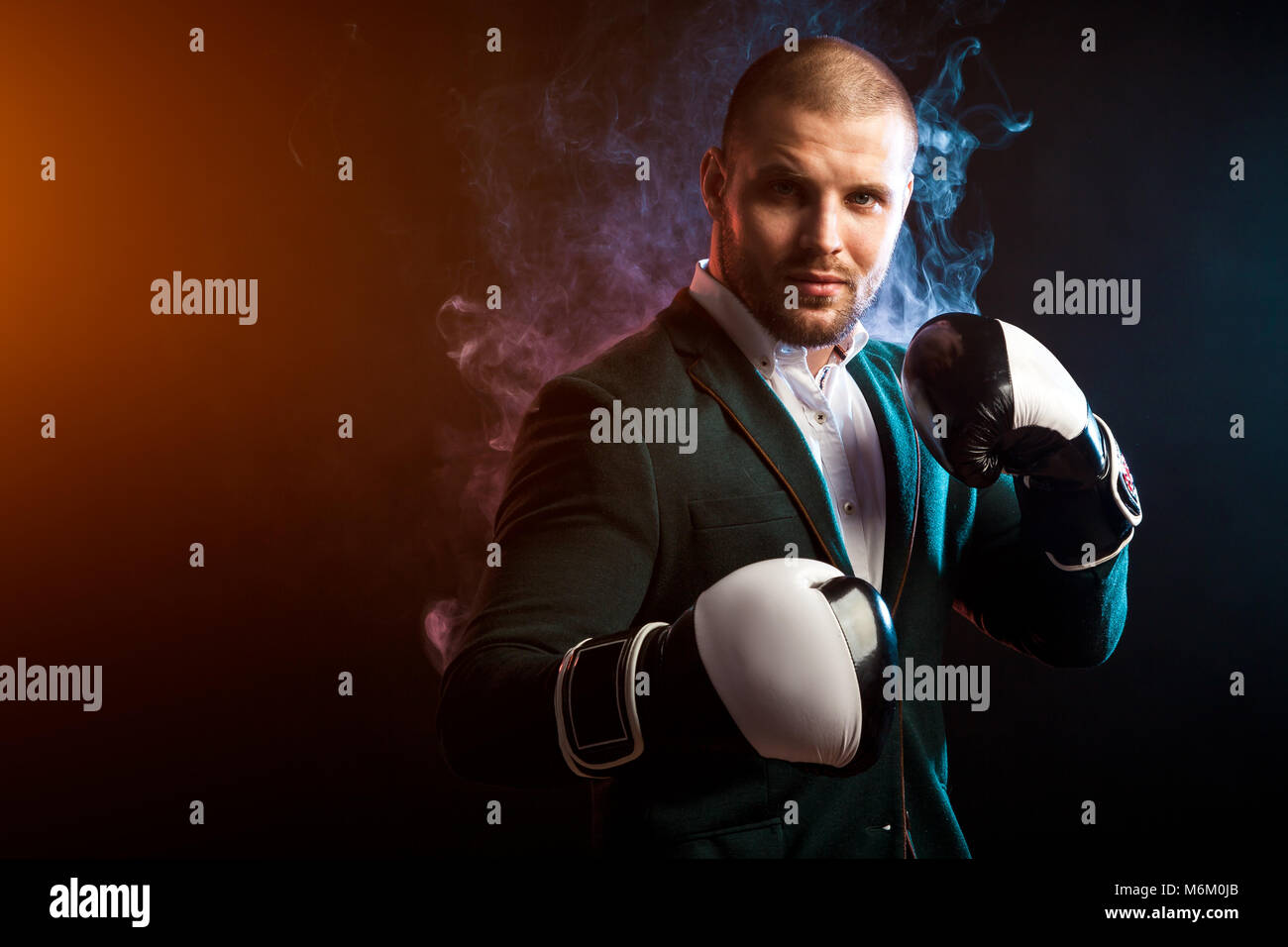 Young handsome businessman man in white shirt, green jacket, black and