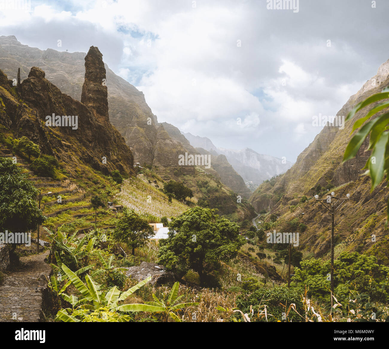 Picturesque canyon Ribeira da Torre covered with lush vegetation. Cultivation on steep terraced hills banana trees, sugarcane and coffee. Xo-Xo valley Santo Antao Cape Verde Cabo Verde Stock Photo