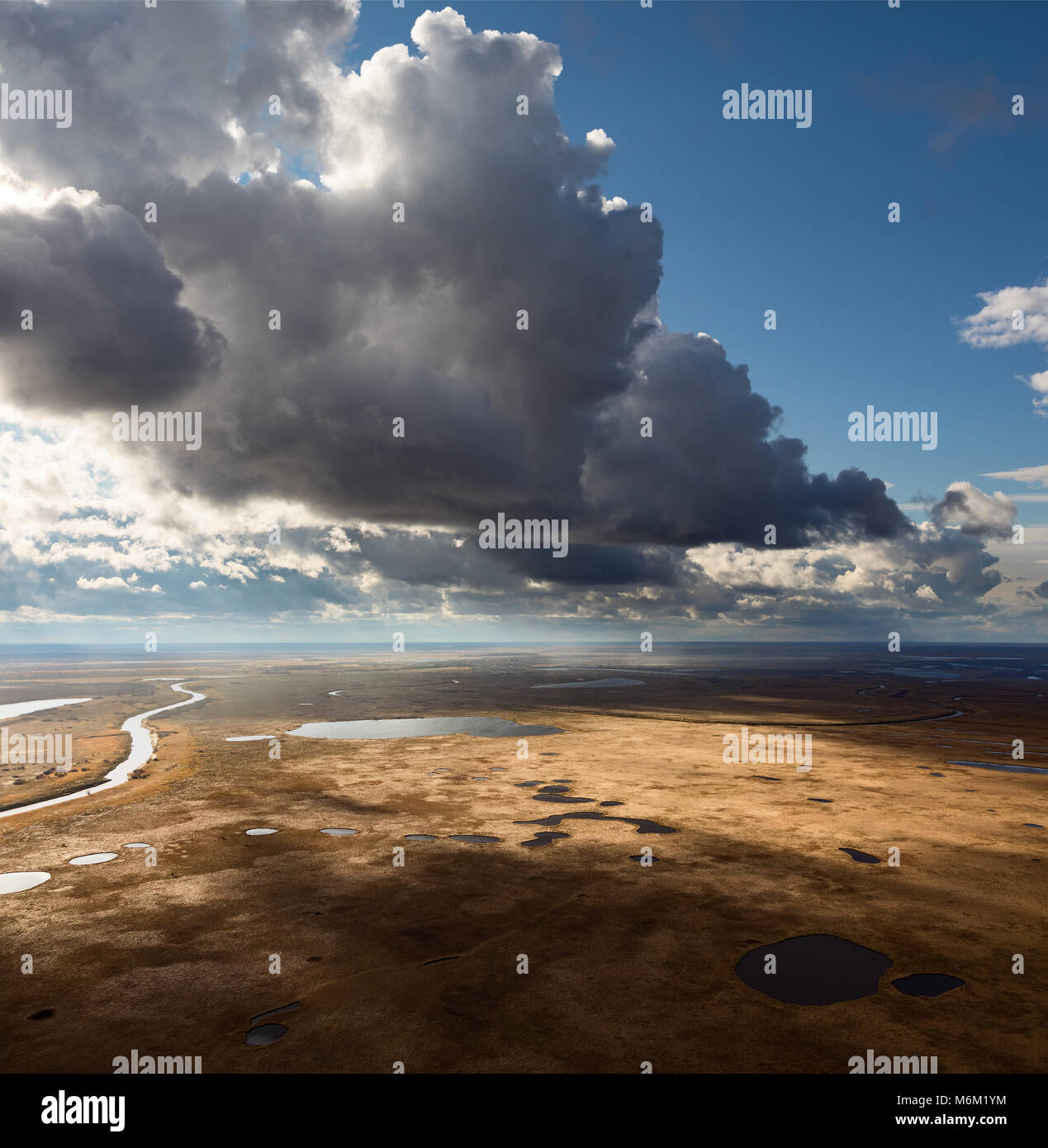 Cloudy day above the tundra in autumn, top view Stock Photo