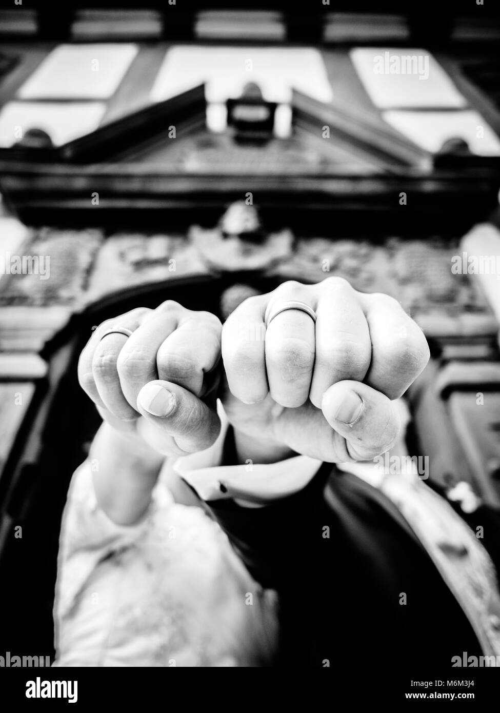 show off in front of the ornate two people of the wedding ring Stock Photo