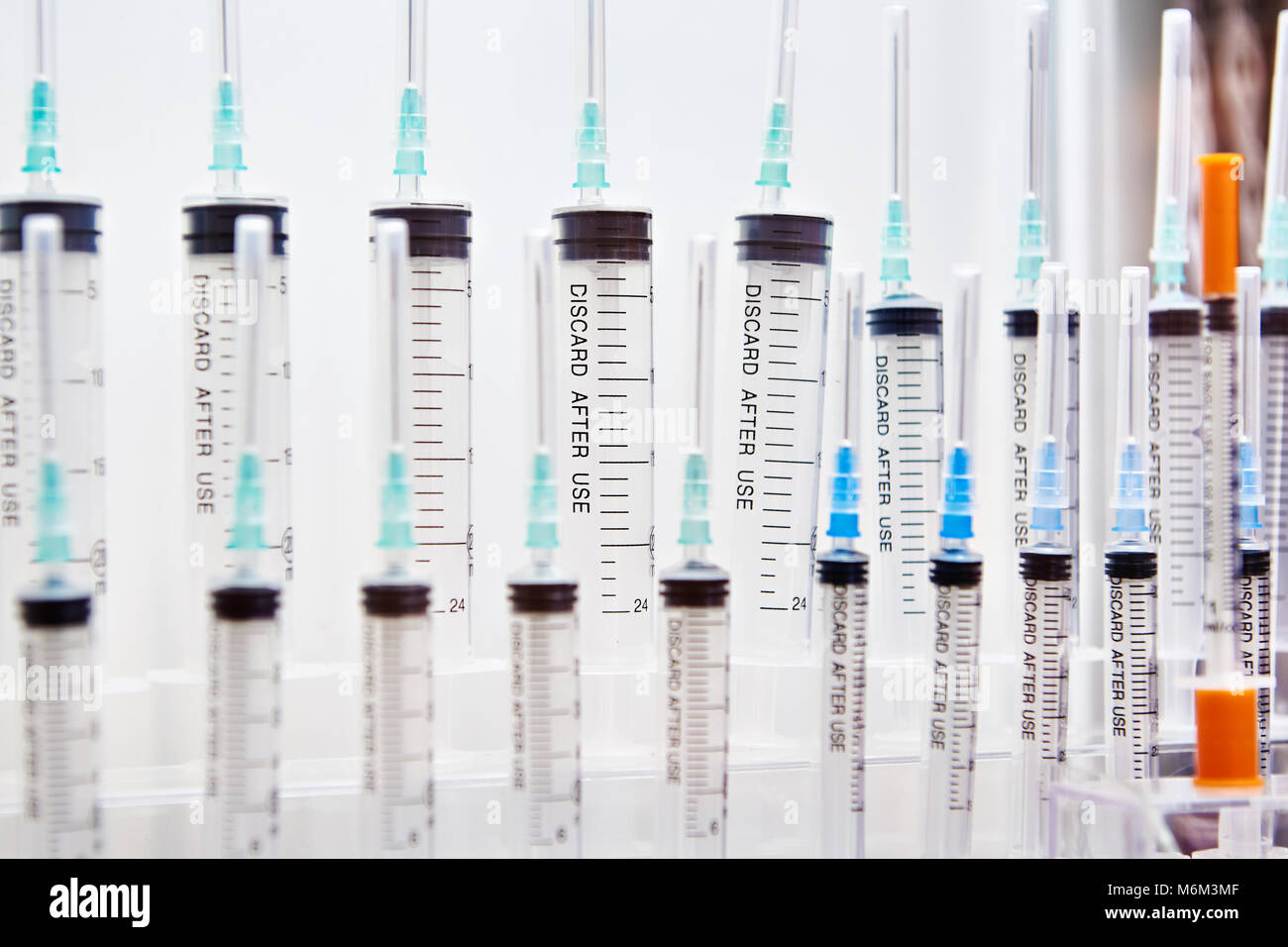 Medical disposable syringes of different volumes Stock Photo