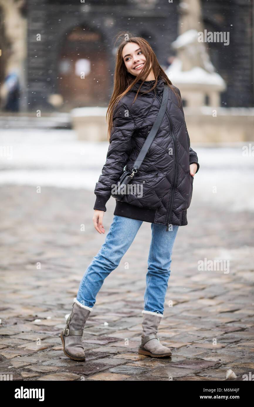 Woman Wearing a Fashionable Winter Outfit Standing Outside · Free