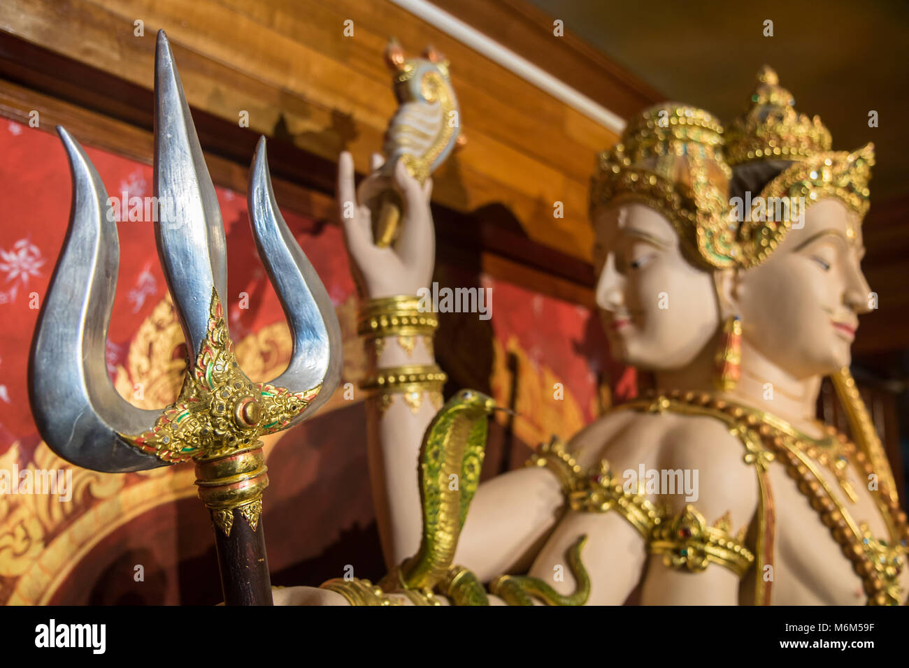 SAMUT PRAKAN. THAILAND, JUN 05 2017, Hindu God Shiva sculpture in monastery, Thailand. Lord Shiva statue inside Hindu temple. Stock Photo
