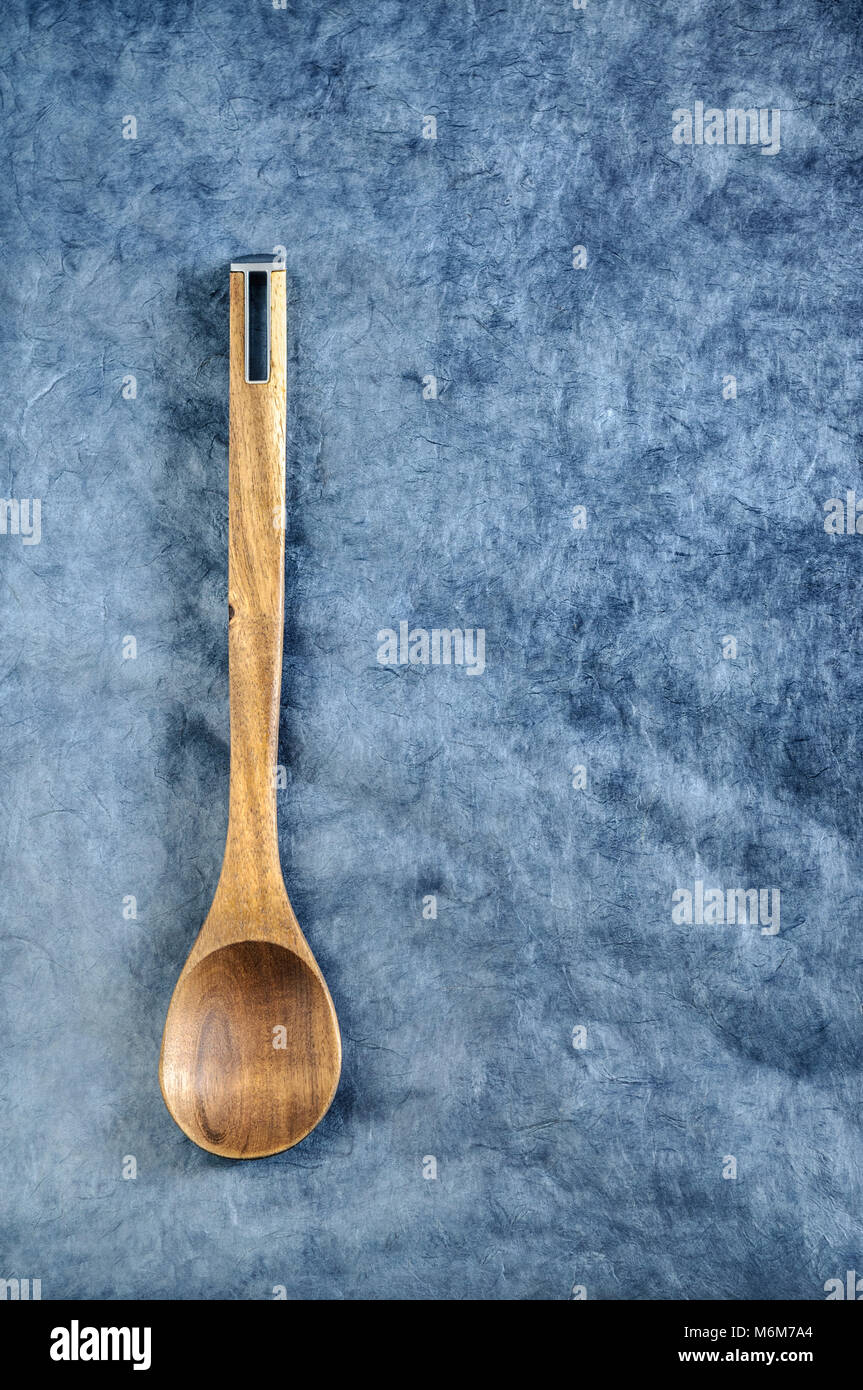Large, rustic serving spoon made of wood Stock Photo Alamy