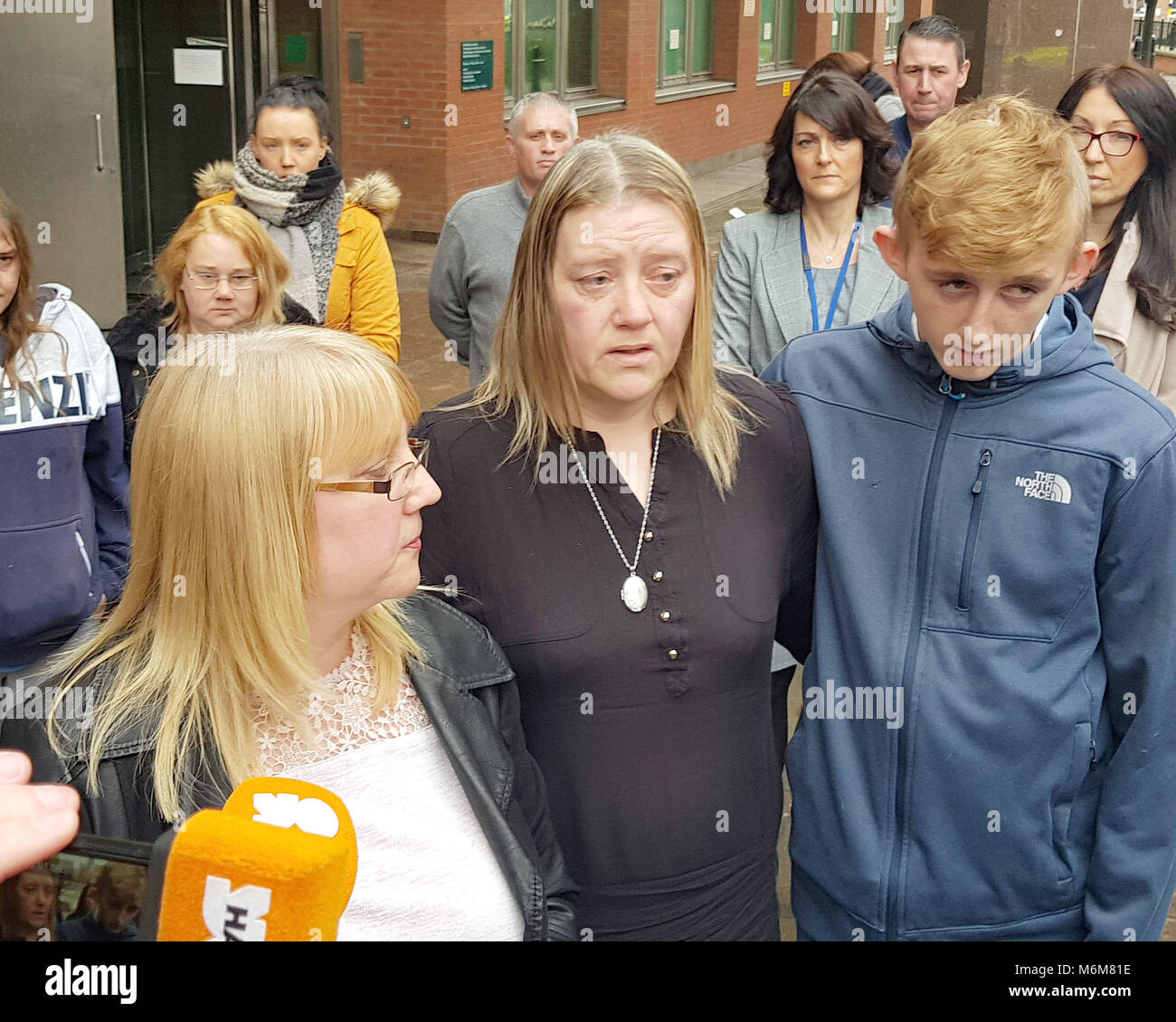Mother Paula Appley (centre) and twin brother Levi of Leonne Weeks, 16, who was stabbed to death in January last year, stand outside of Sheffield Crown Court, as Shea Peter Heeley, 19, has been jailed for at least 24-and-a-half years for the murder of the teen. Stock Photo