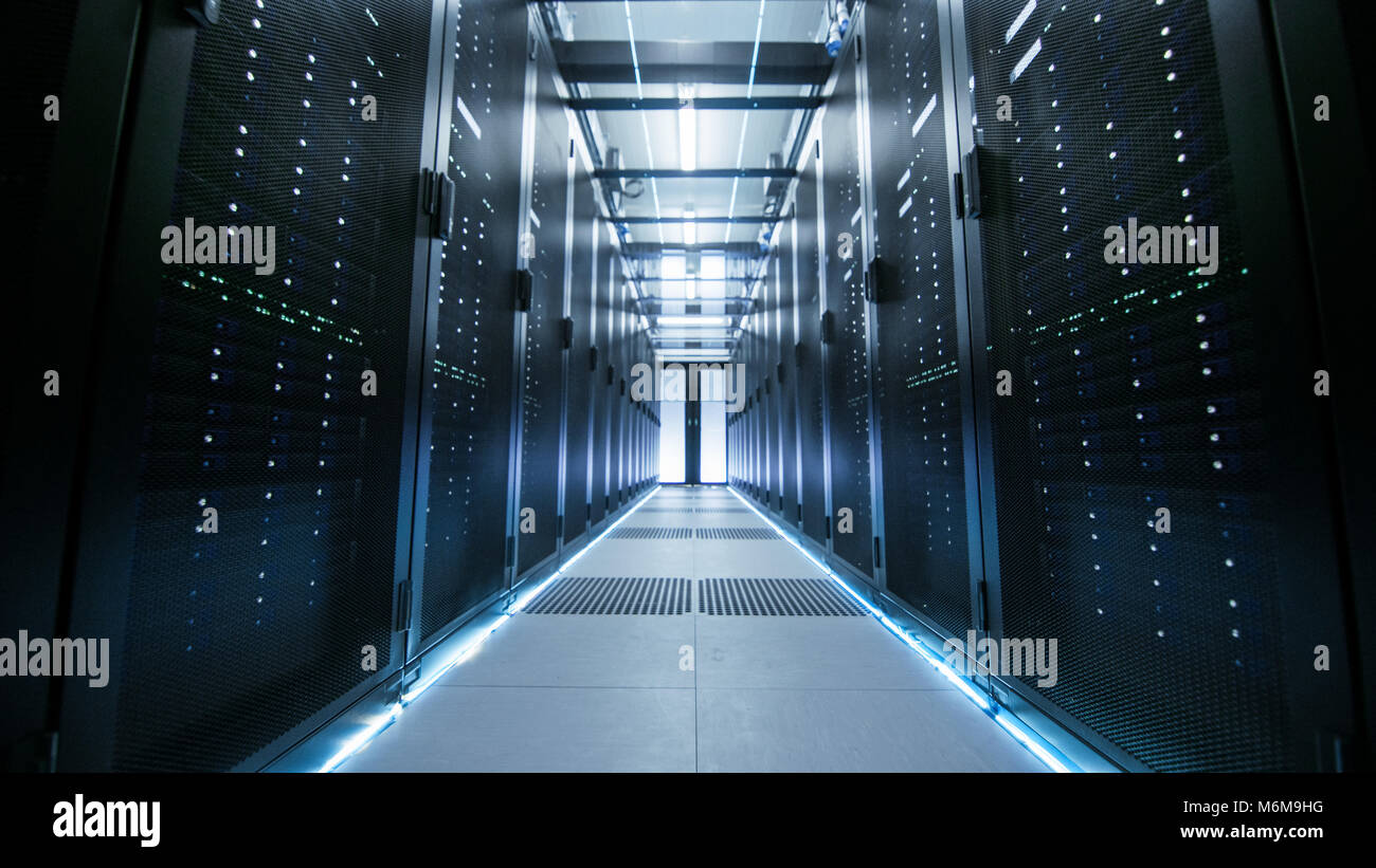 Shot of a Working Data Center With Rows of Rack Servers. Stock Photo